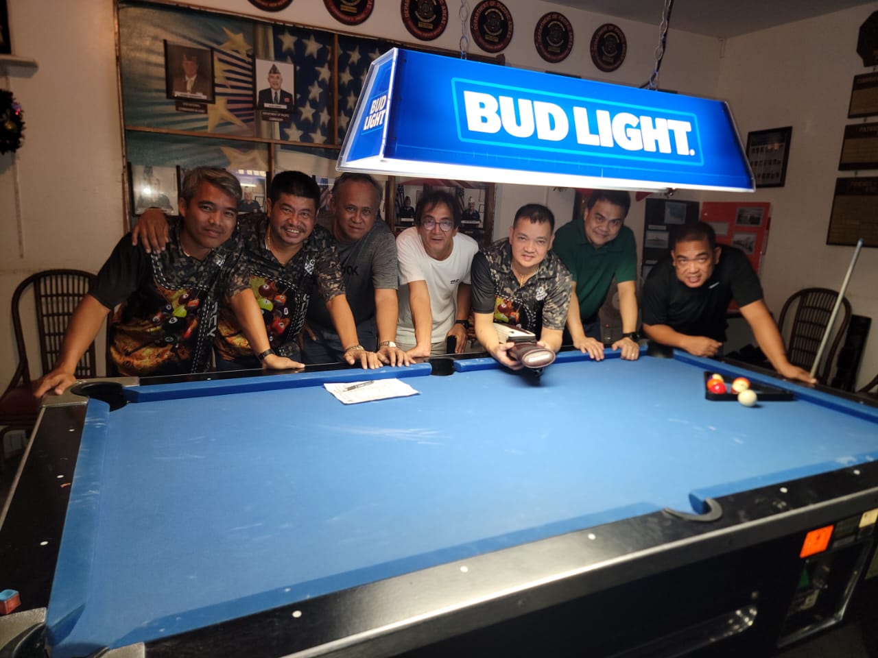 The Rendezvous Warriors pose for a photo after winning  a Thursday Division semifinal match of the 2023 SBA Budweiser Open 8-Ball League at the VFW Bar.