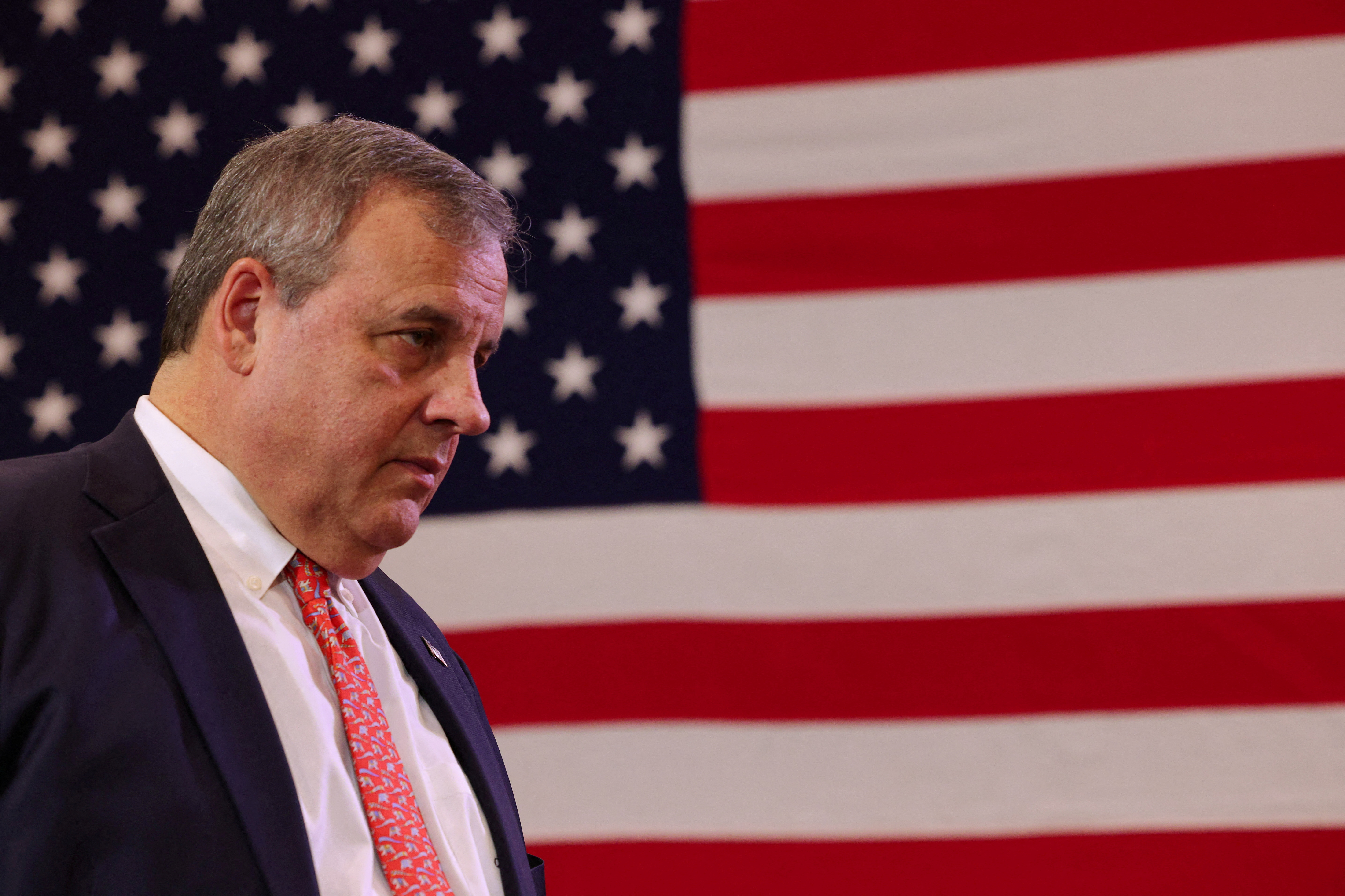 Republican presidential candidate and former New Jersey Governor Chris Christie listens to a question from the audience during a campaign town hall in Epping, New Hampshire, U.S., December 28, 2023. 