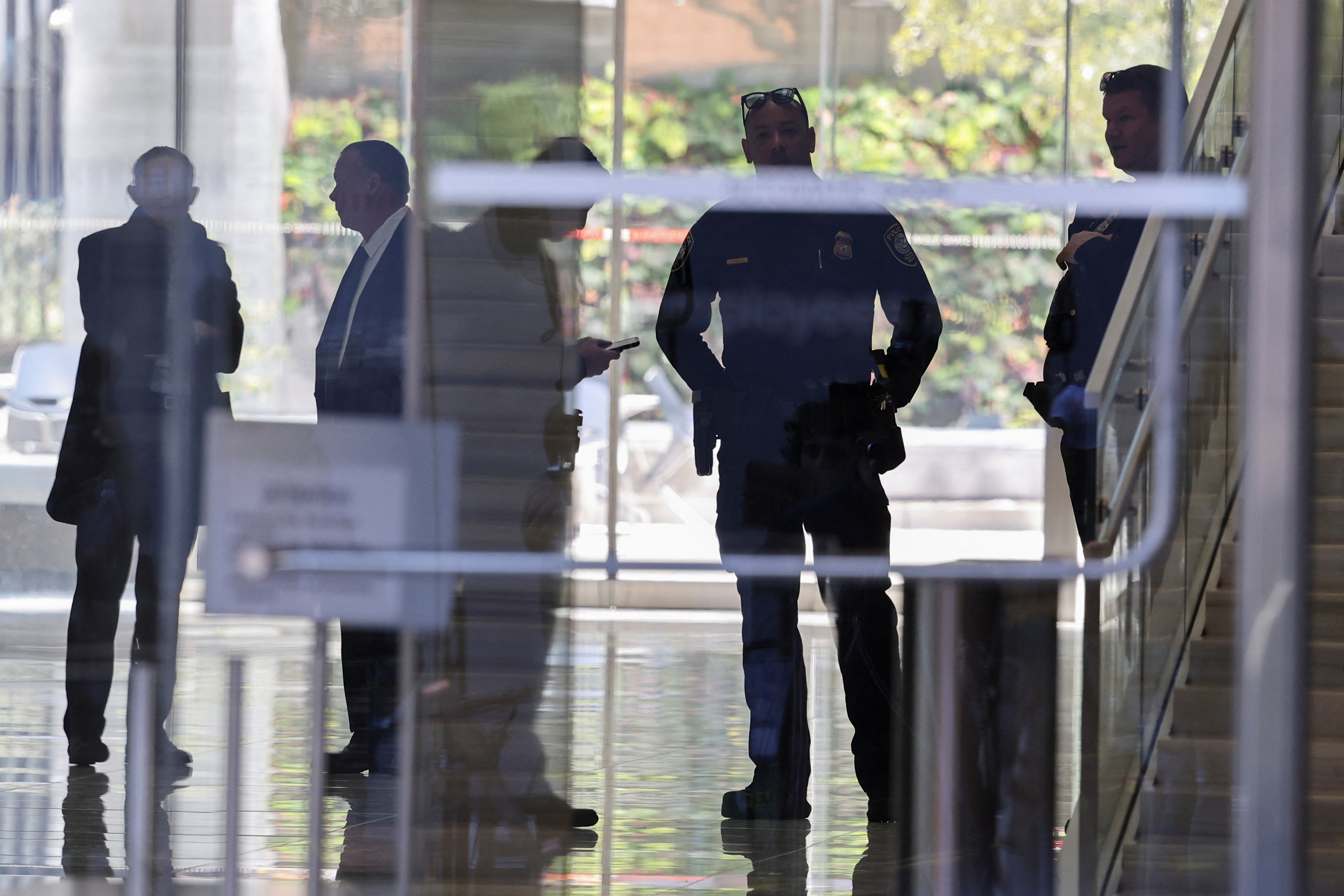 Federal police officers and security personnel stand inside a federal court on the day Hunter Biden, son of U.S. President Joe Biden, makes his initial court appearance on tax charges, in Los Angeles, California, U.S., January 11, 2024. 