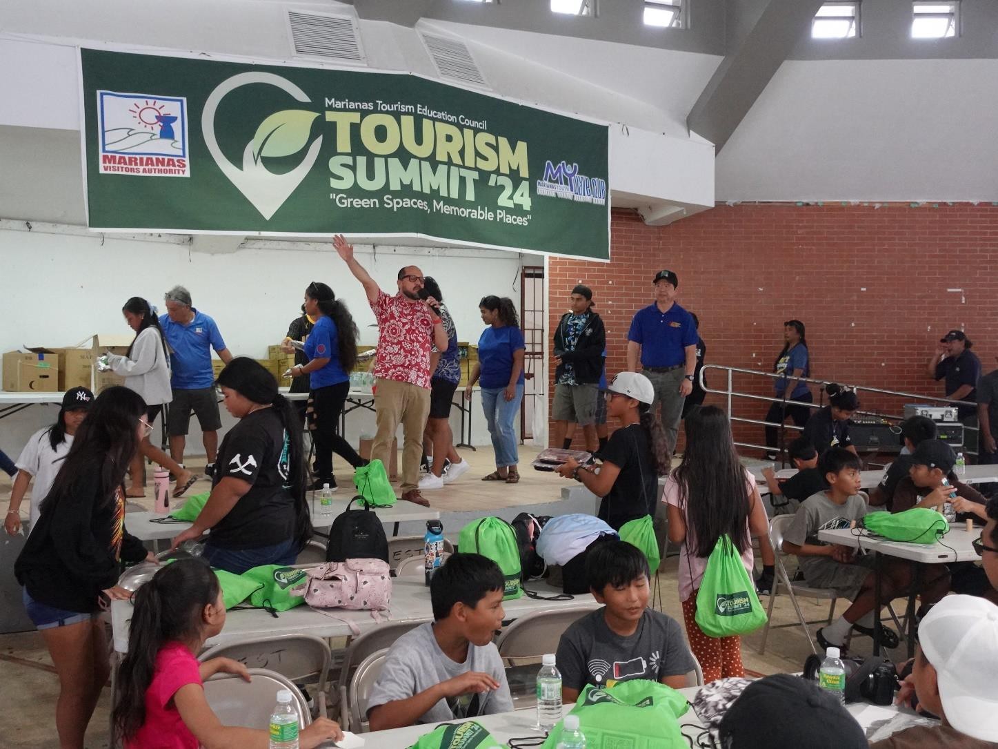 Northern Marianas College President and Marianas Tourism Education Council Tourism Summit 2024 Committee Chairman Galvin Deleon Guerrero welcomes students at Garapan Central Park during the Marianas Tourism Education Council on Jan. 19, 2024.  Earlier in the day, students had educational lectures at major tourist sites in Marpi.