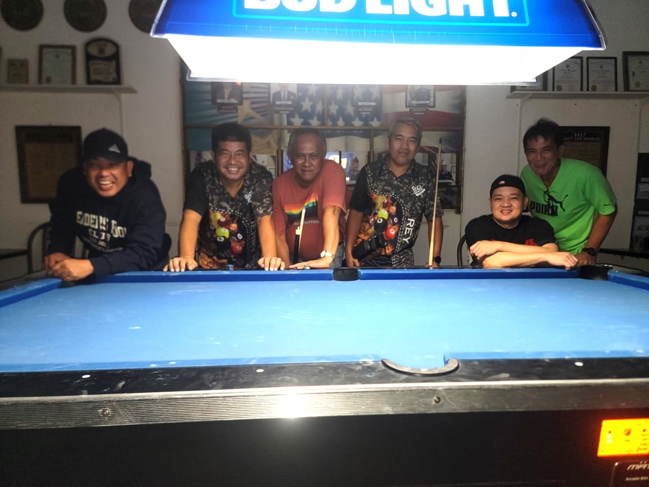 The Rendezvous Warriors pose for a photo after winning a quarterfinal match in the Thursday division of the 2023 Budweiser Open 8-Ball League at the VFW Bar on Thursday.