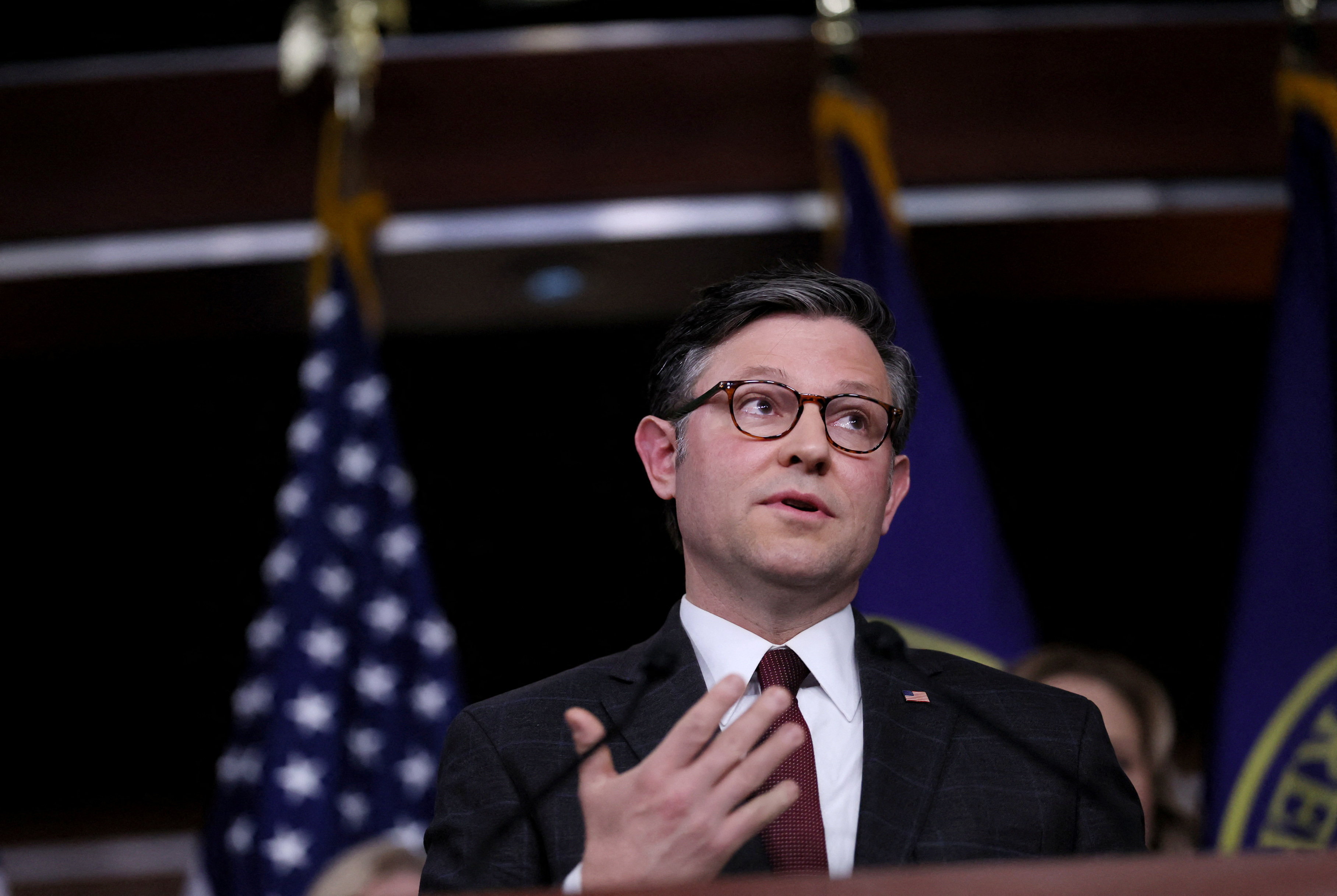 U.S. House Speaker Mike Johnson (R-LA) takes questions during a press conference also featuring House Majority Whip Tom Emmer (R-MN), U.S. Rep. Michelle Fischbach (R-MN) and U.S. Rep. Ashley Hinson (R-IA) at the U.S. Capitol building in Washington, U.S., January 17, 2024. 