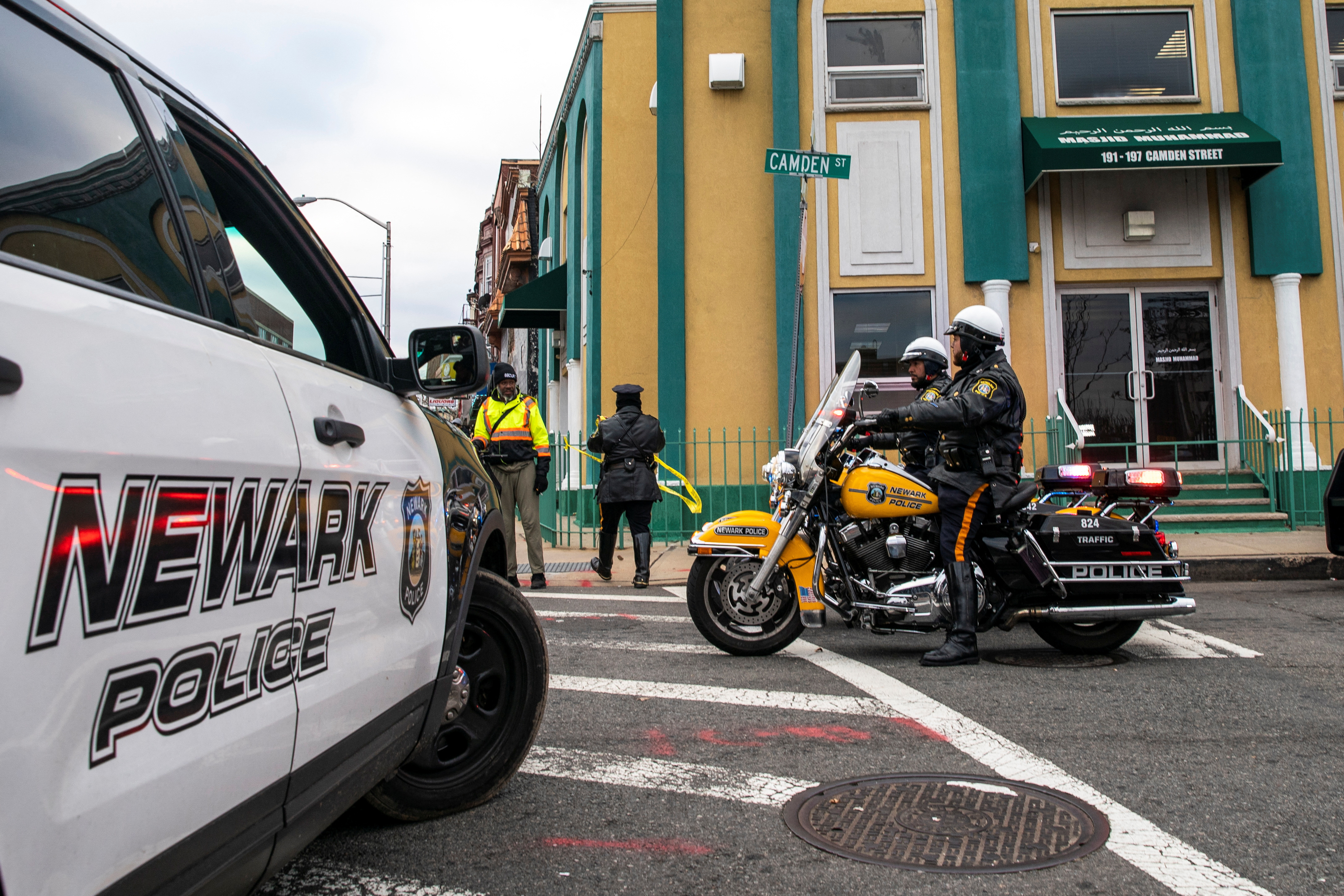 Newark Police Officers stand guard outside the Masjid Muhammad-Newark mosque following the shooting of Imam Hassan Sharif in Newark, New Jersey, U.S., January 3, 2024.