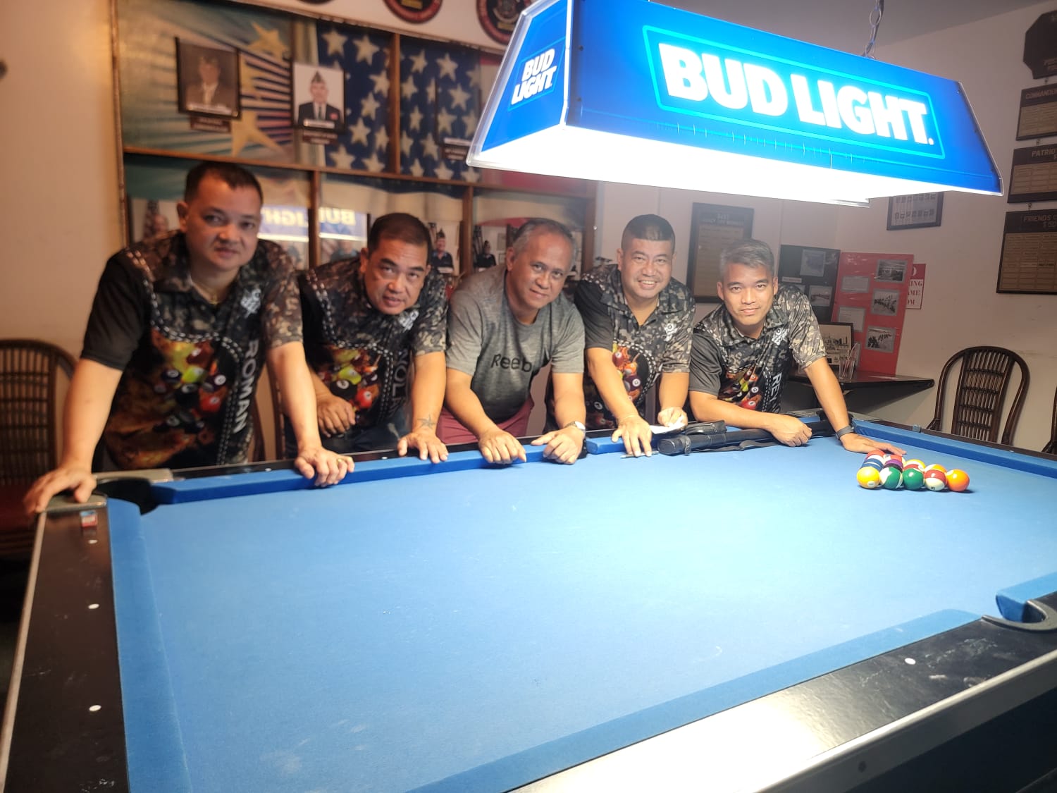 The Rendezvous Warriors pose for a photo after a Thursday division game of the 2023 SBA Budweiser Open 8-Ball League at the VFW Bar.