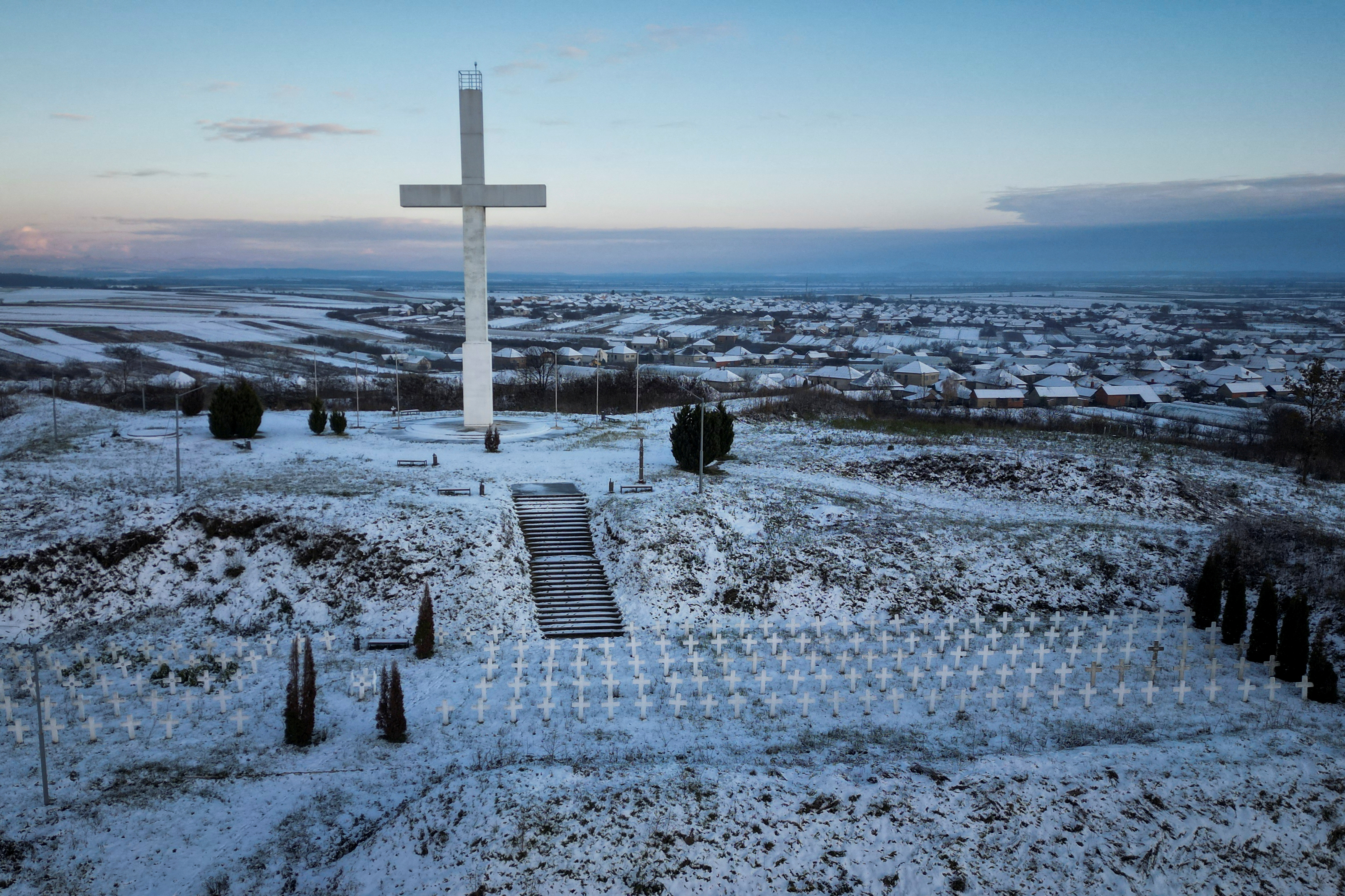 An aerial view shows the European Park of Reconciliation commemorating those who died during the Second World War, in the village of Dertsen where the majority of residents are ethnic Hungarians, amid Russia's attack on Ukraine, in Zakarpattia region, Ukraine November 29, 2023. 