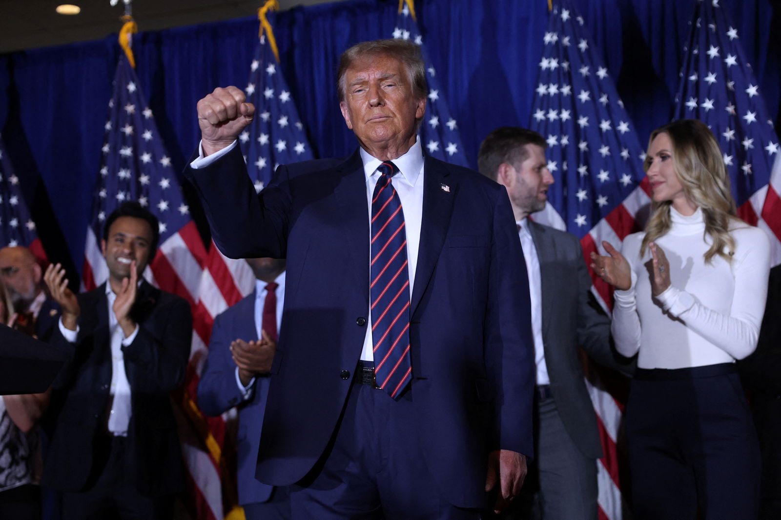 Republican presidential candidate and former U.S. President Donald Trump gestures during his New Hampshire presidential primary election night watch party, in Nashua, New Hampshire, U.S., January 23, 2024. 