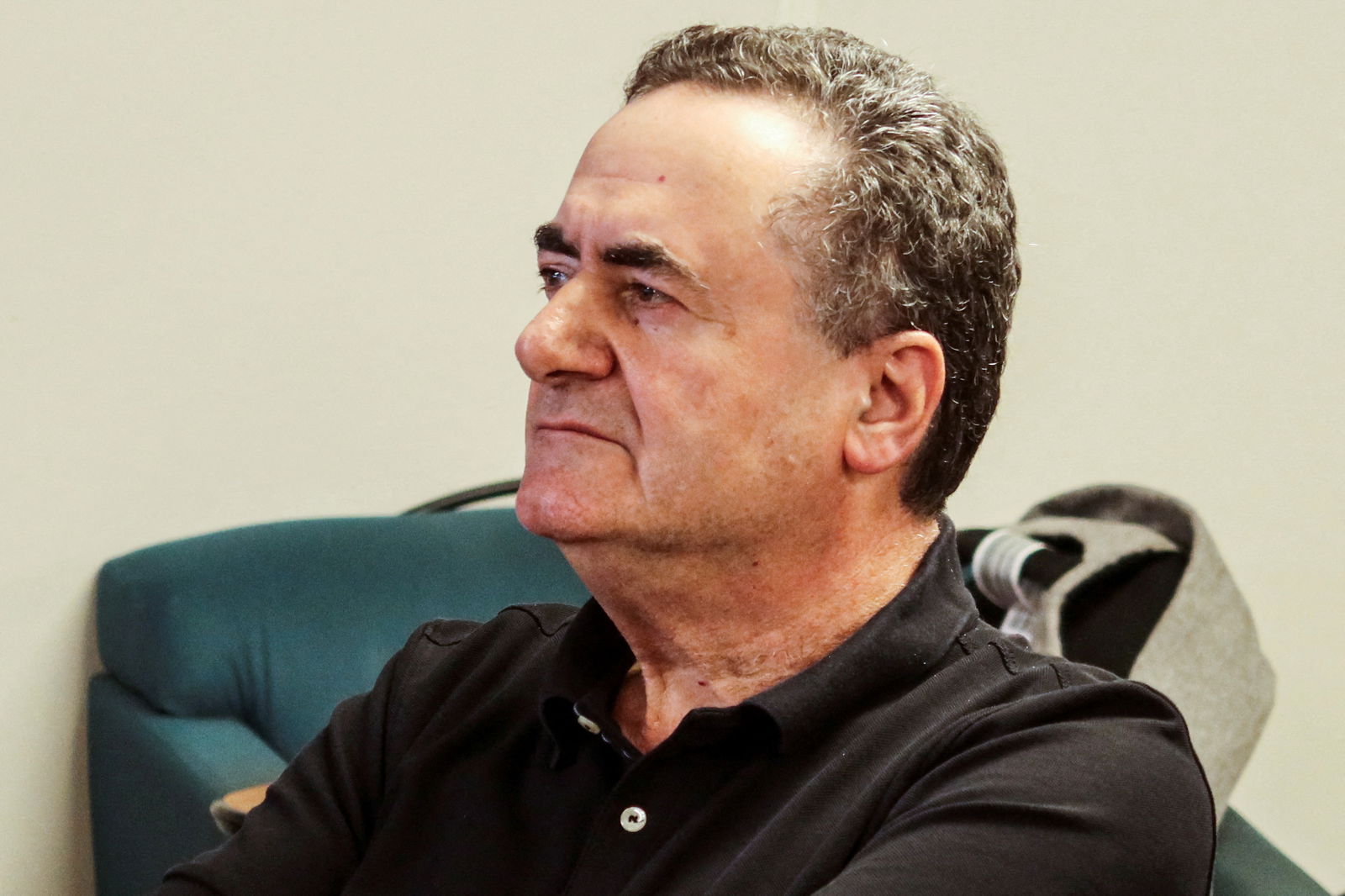 Israeli Energy Minister Israel Katz listens to a talk on the gas platform for Leviathan, Israel's largest gas field, talks, near Haifa bay, northern Israel, August 1, 2023. 