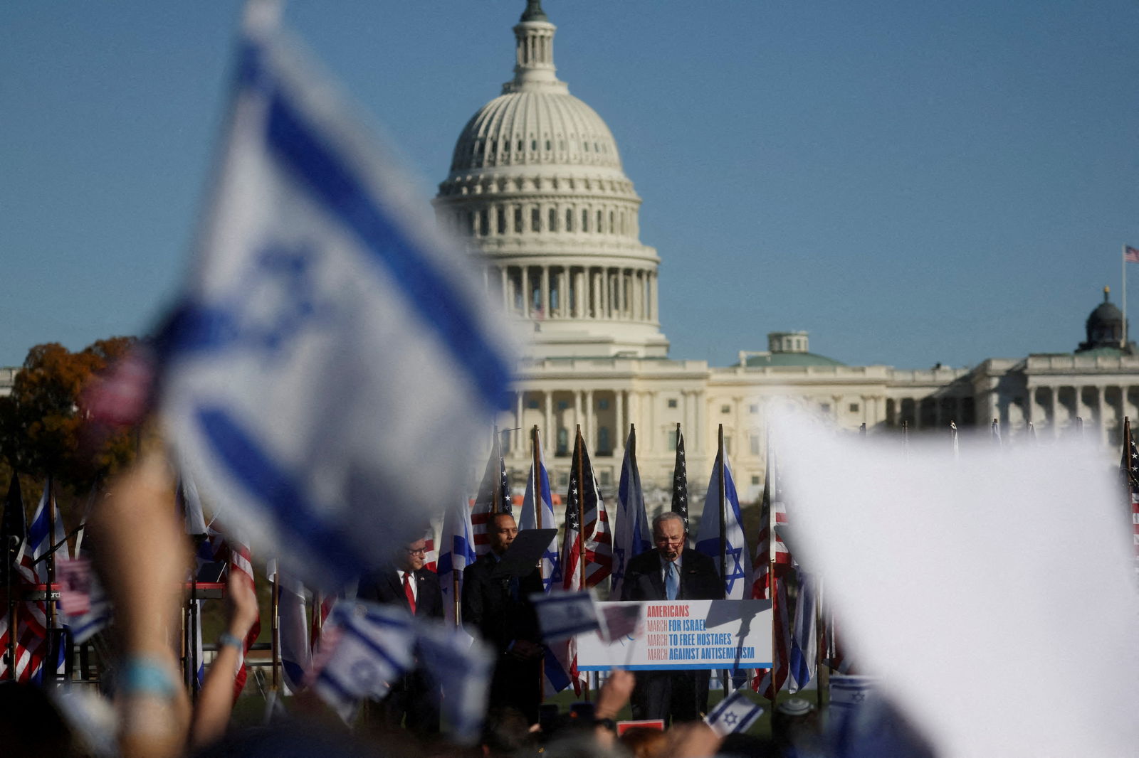 Jewish Americans and supporters of Israel gather in solidarity with Israel and protest against antisemitism, amid the ongoing conflict between Israel and the Palestinian group Hamas, during a rally on the National Mall in Washington, U.S, November 14, 2023. 