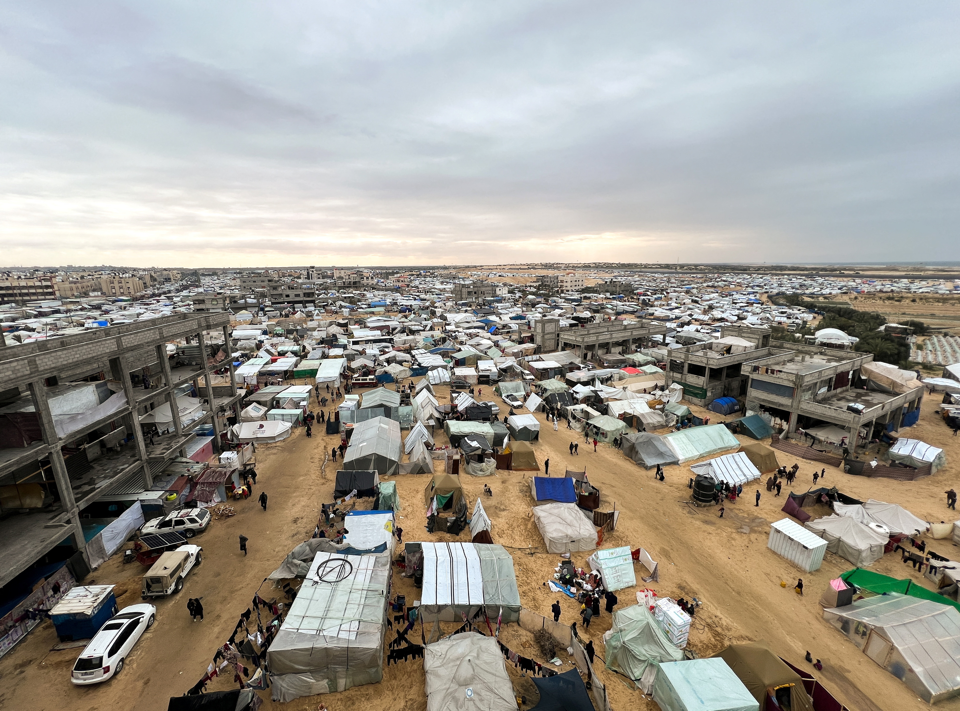 Displaced Palestinians, who fled their houses due to Israeli strikes, shelter at a tent camp, amid the ongoing conflict between Israel and the Palestinian Islamist group Hamas, in Rafah in the southern Gaza Strip January 28, 2024. 