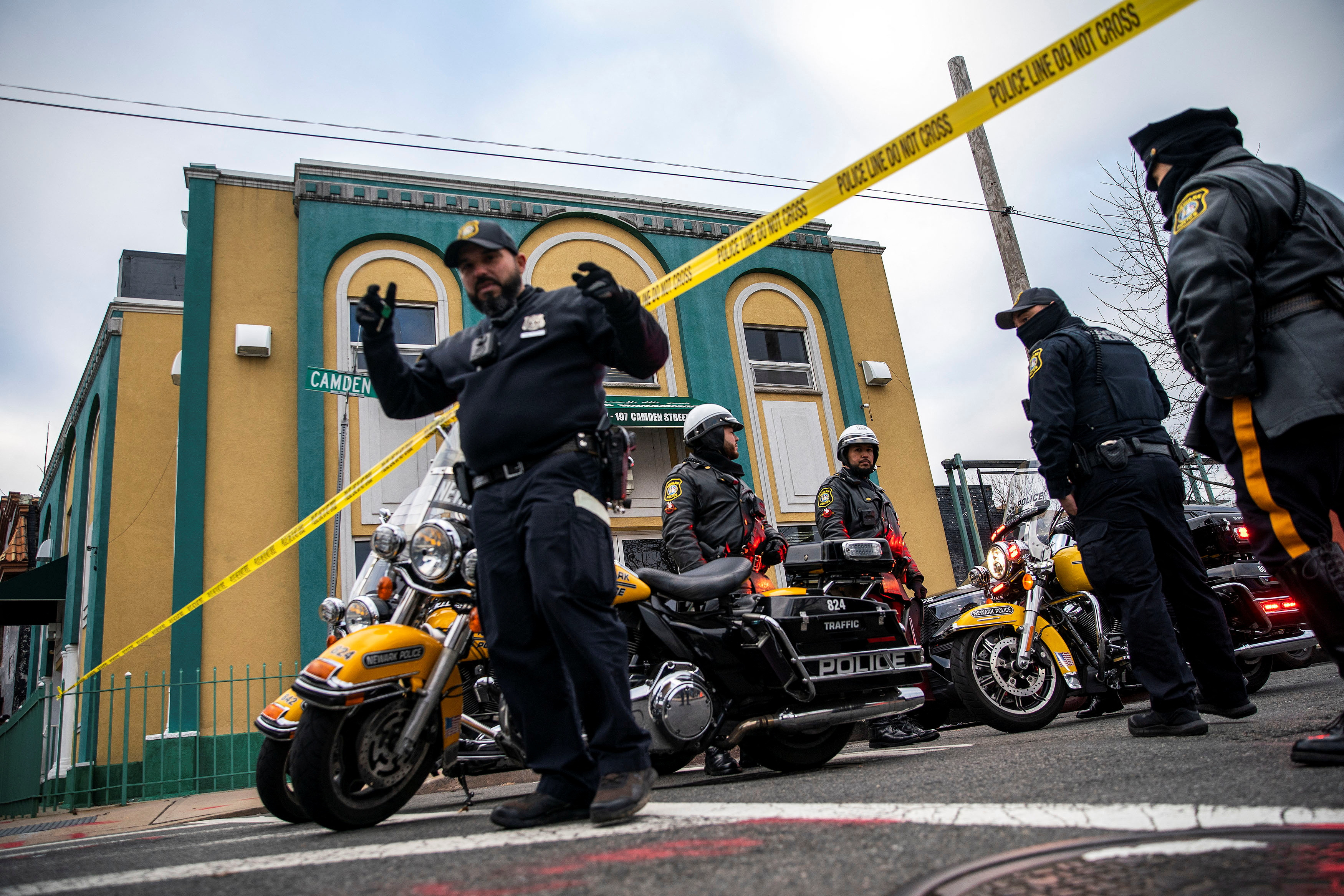 Newark Police Officers stand guard outside the Masjid Muhammad-Newark mosque following the shooting of Imam Hassan Sharif in Newark, New Jersey, U.S., January 3, 2024. 