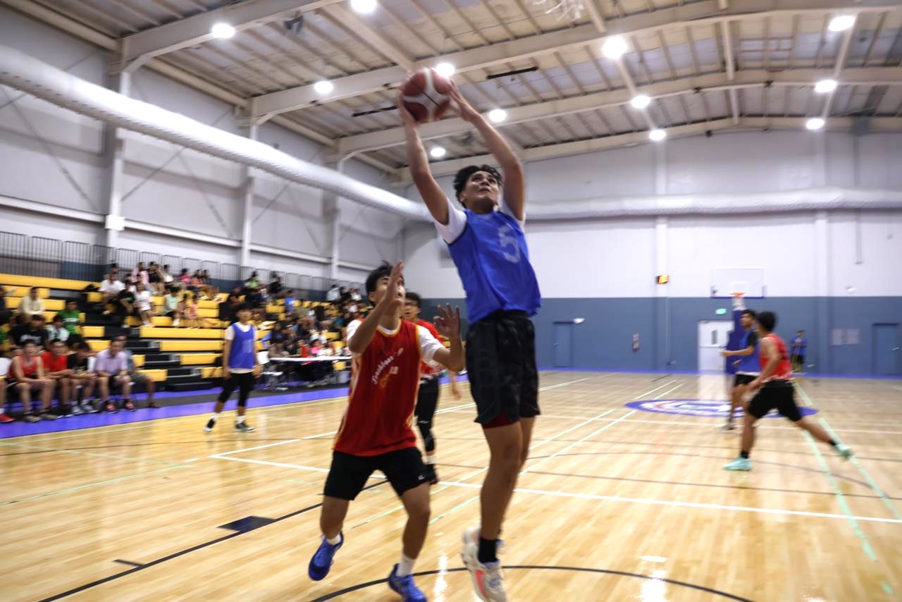 Marianas High School's Kenny Laquian pulls up for the finish during a boys high school division game of the IT&E Interscholastic Basketball League SY23-24 at the Ada gym.