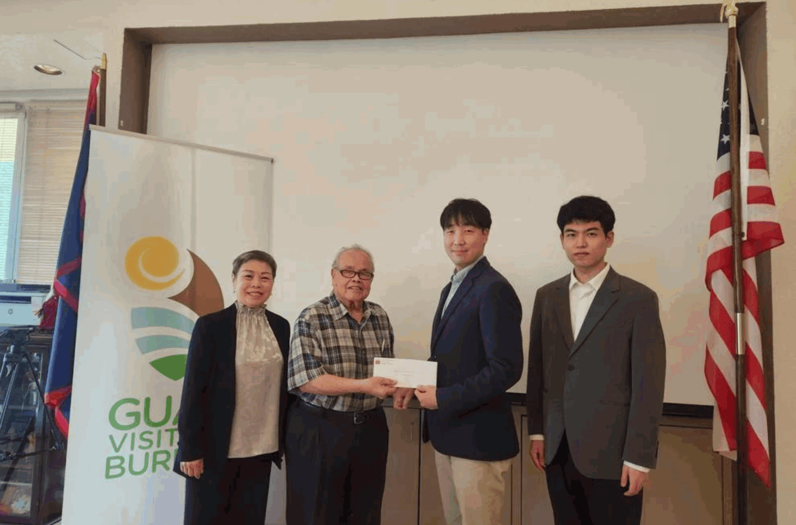 From left, Letitia Law-Byerly, marketing manager, Lotte Duty Free Guam; Gerry Perez, vice president, Guam Visitors Bureau; Jaejun Lee, CEO, Lotte Duty Free Guam; and Joohyung Hwangbo, chief financial officer/chief operating officer, Lotte Duty Free Guam.