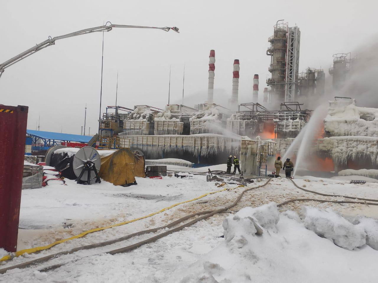 Firefighters work to extinguish fire at a terminal belonging to Novatek, Russia's largest liquefied natural gas producer, in the port of Ust-Luga, Russia, January 21, 2024. 