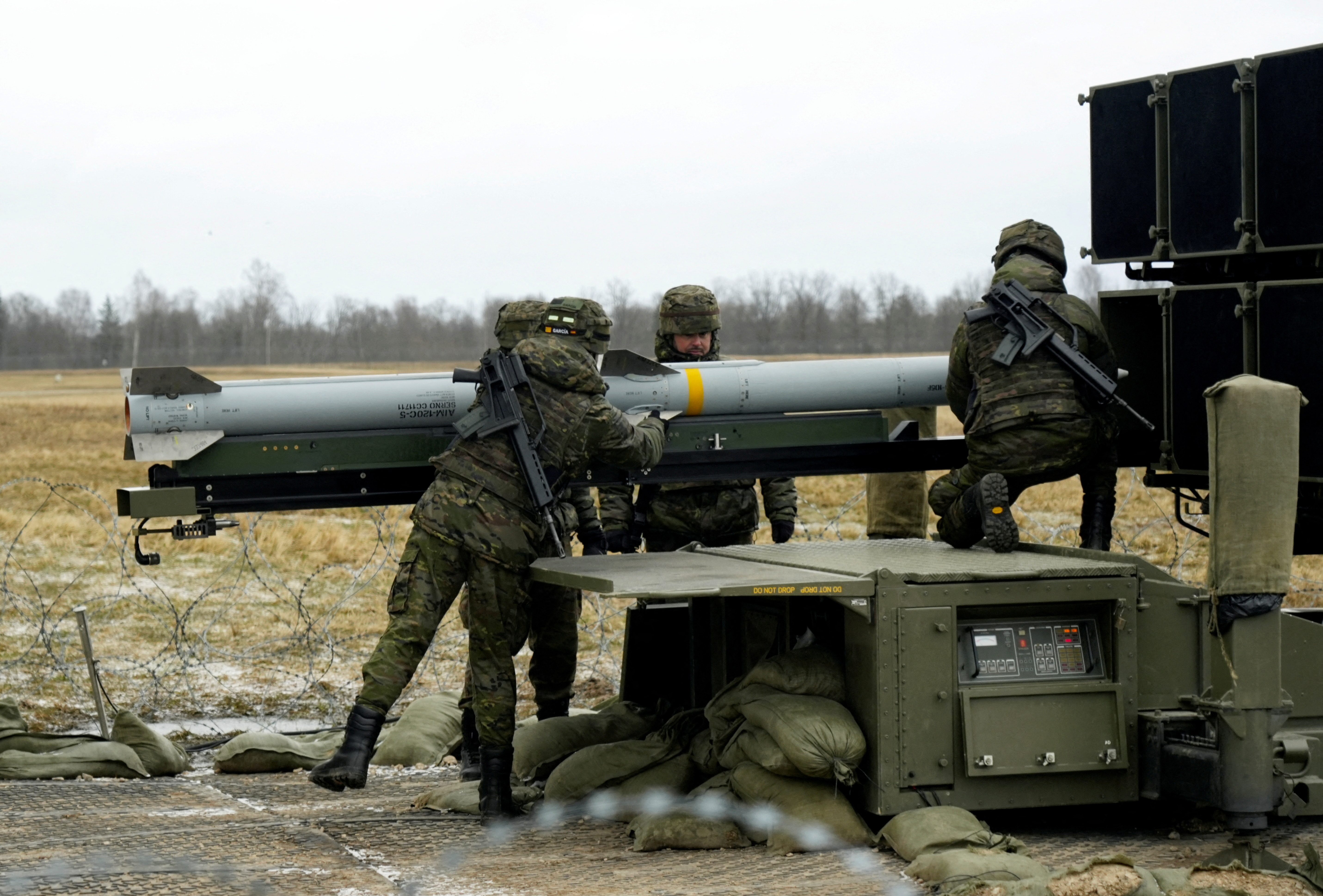 Spanish army servicemen prepare NASAMS medium range ground-based air defence rocket launcher, in Lielvarde air base, Latvia March 29, 2023. 