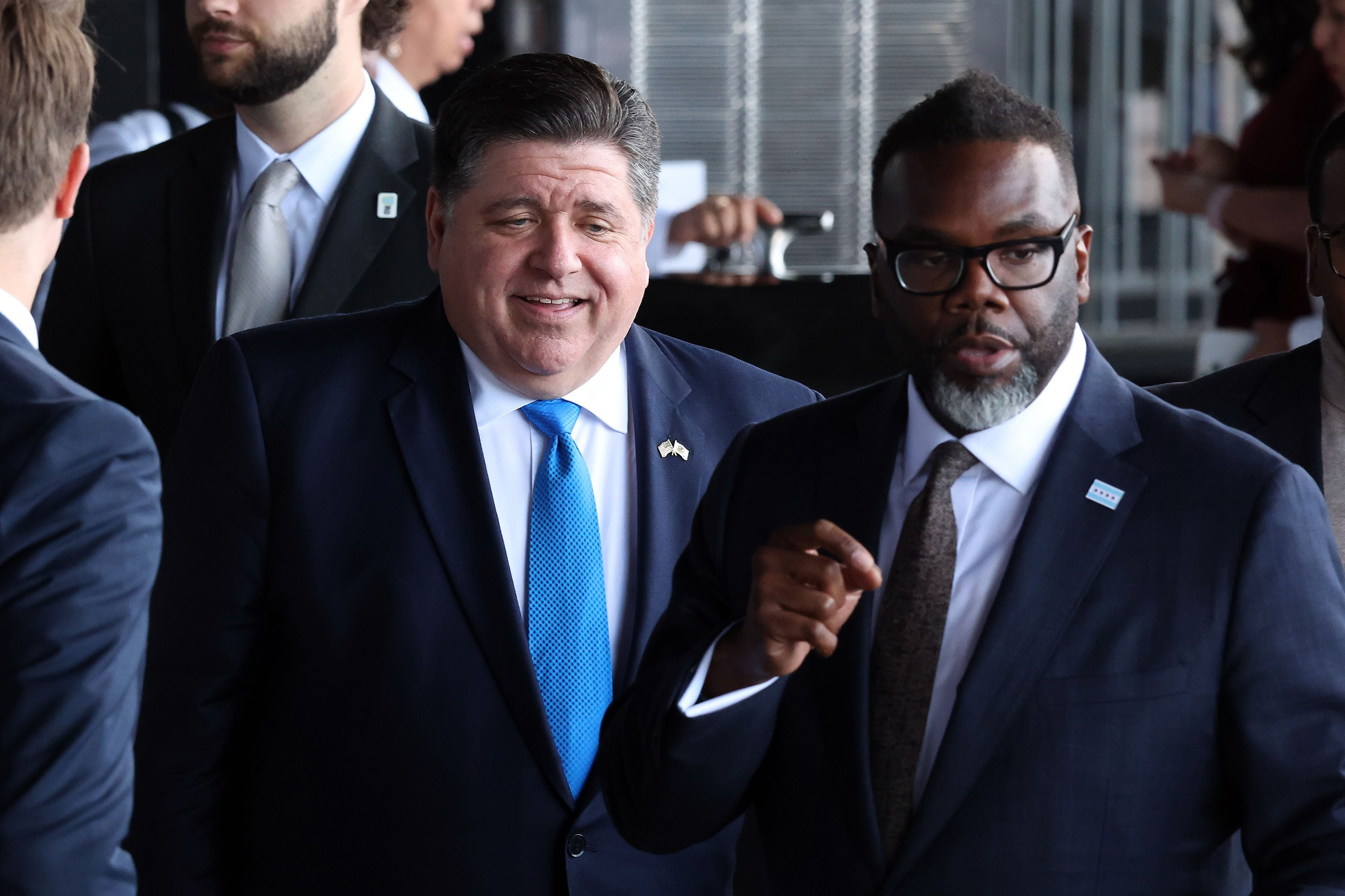 Illinois Gov. J.B. Pritzker, left, and Chicago Mayor Brandon Johnson attend a Labor Day reception organized by the Chicago Federation of Labor at McCormick Place on Aug. 30, 2023. 