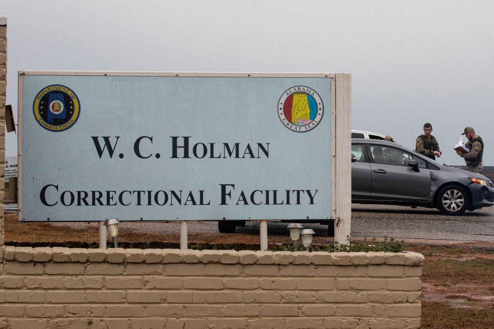 Vehicles are inspected by law enforcement at the Holman Correctional Facility gate before the scheduled execution by asphyxiation using pure nitrogen, of Kenneth Smith who is convicted for a murder-for-hire committed in 1988, in Atmore, Alabama, U.S. January 25, 2024. 