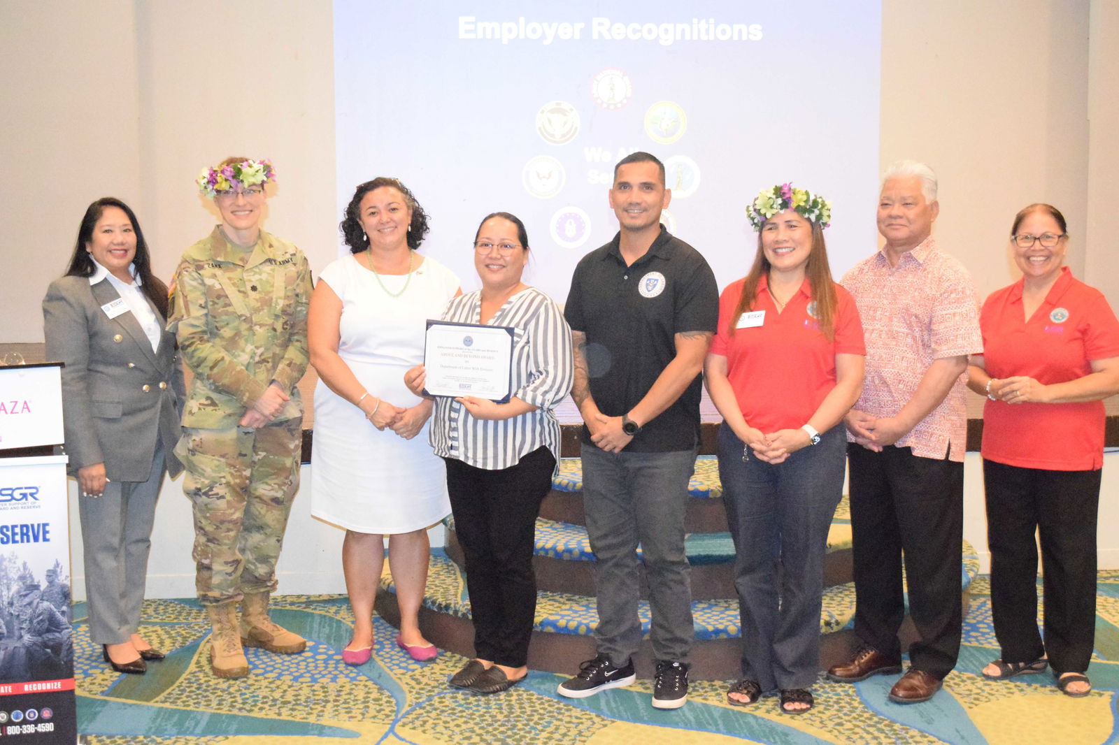 CNMI Department of Labor Secretary Leila Staffler, 3rd left, and Workforce Investment Director Frances Torres, 4th left, with Gov. Arnold I. Palacios, second right, National ESGR Chief for the Northeast and West LTC Agatha Zana, second left, ESGR Guam-CNMI State Committee Chair Cathy Gogue, third right, ESGR-CNMI Area Chair Dr. Rita A. Sablan, right, Ombudsman Joann Aquino, left, and Staff Sgt. Joe Villacrusis, a CNMI Labor employee, during the “Lunch with the Boss” awards ceremony at Crowne Plaza Resort & Spa's Hibiscus Hall on Thursday.