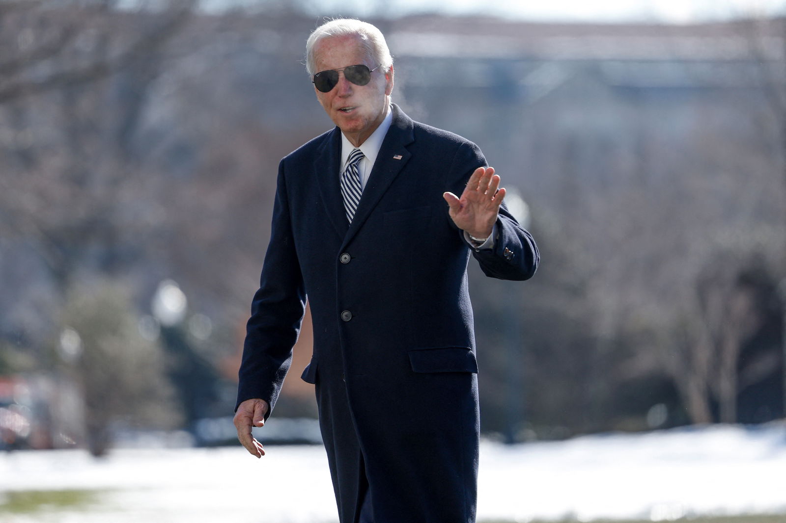 U.S. President Joe Biden waves towards the media after landing on the South Lawn of the White House in Washington, U.S., January 22, 2024. 