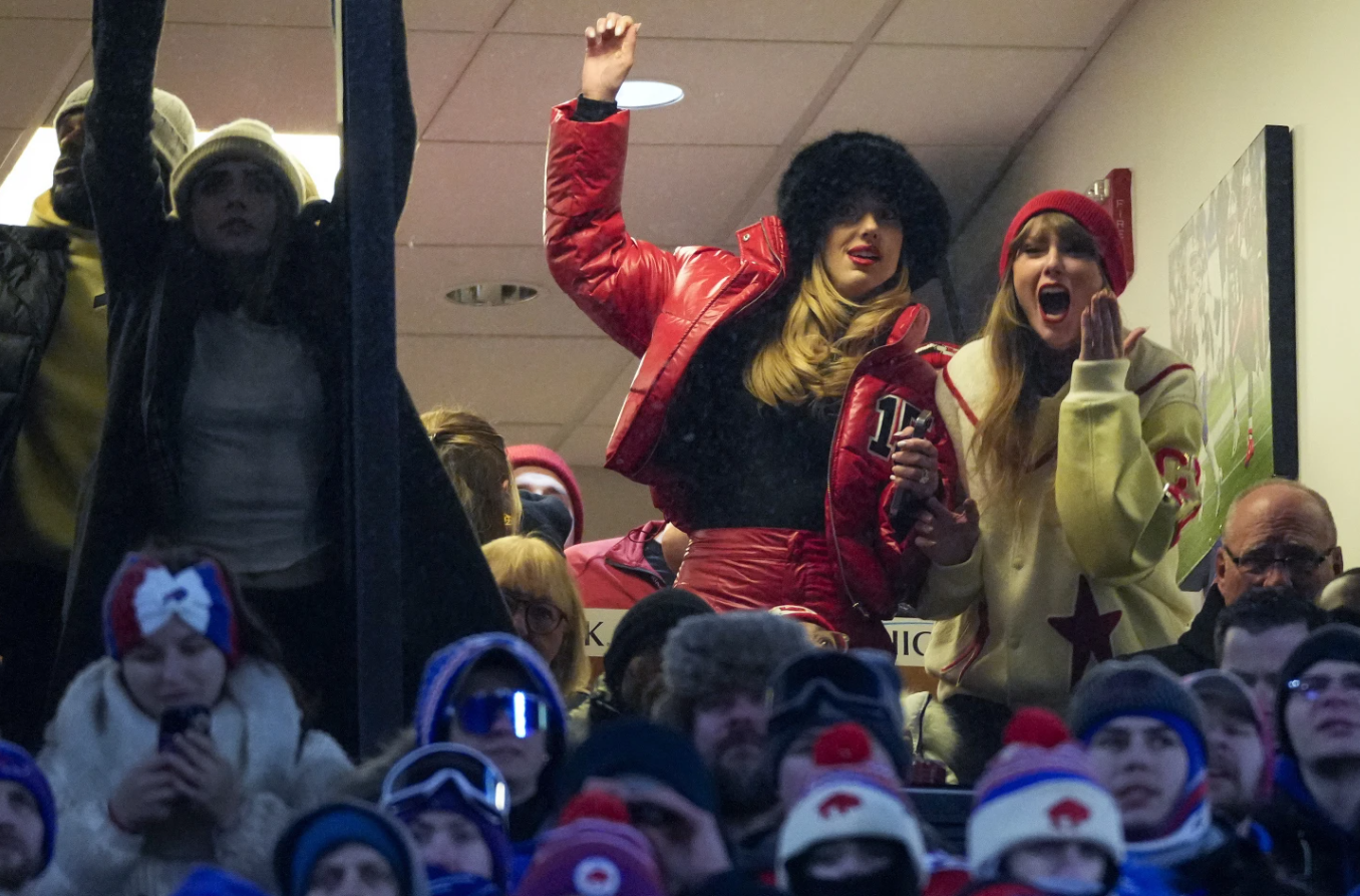 Taylor Swift, right and Brittany Mahomes react during the third quarter of an NFL AFC division playoff game between the Buffalo Bills and the Kansas City Chiefs, Sunday, Jan. 21, 2024 in Orchard Park, N.Y.