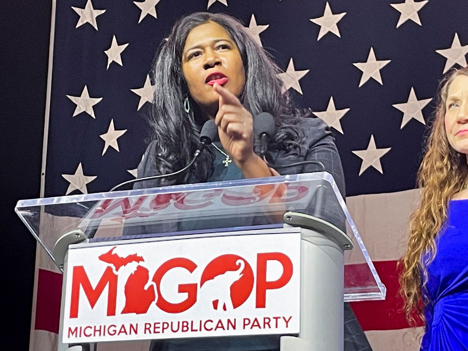 Kristina Karamo, a candidate for the Michigan Republican Party's state party chair, speaks to delegates ahead of their vote on the key party leadership position, in Lansing, Michigan, U.S., February 18, 2023.