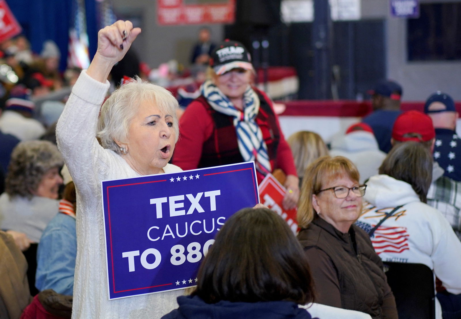 A supporter gestures as she attends a campaign event held by former U.S. President and Republican presidential candidate Donald Trump, in Clinton, Iowa, U.S., January 6, 2024. 