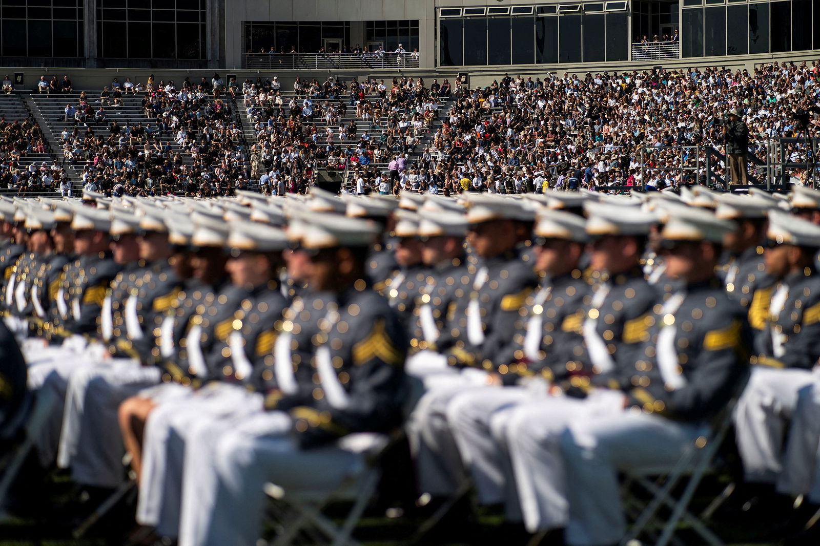 People attend the 2023 graduation ceremony at the United States Military Academy (USMA), at Michie Stadium in West Point, New York, U.S., May 27, 2023. 