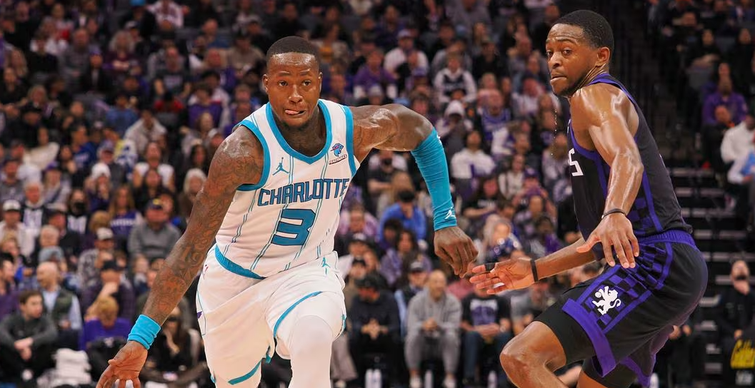 Charlotte Hornets guard Terry Rozier (3) controls the ball against Sacramento Kings guard De'Aaron Fox (5) during the fourth quarter at Golden 1 Center in Sacramento, California, Jan. 2, 2024.