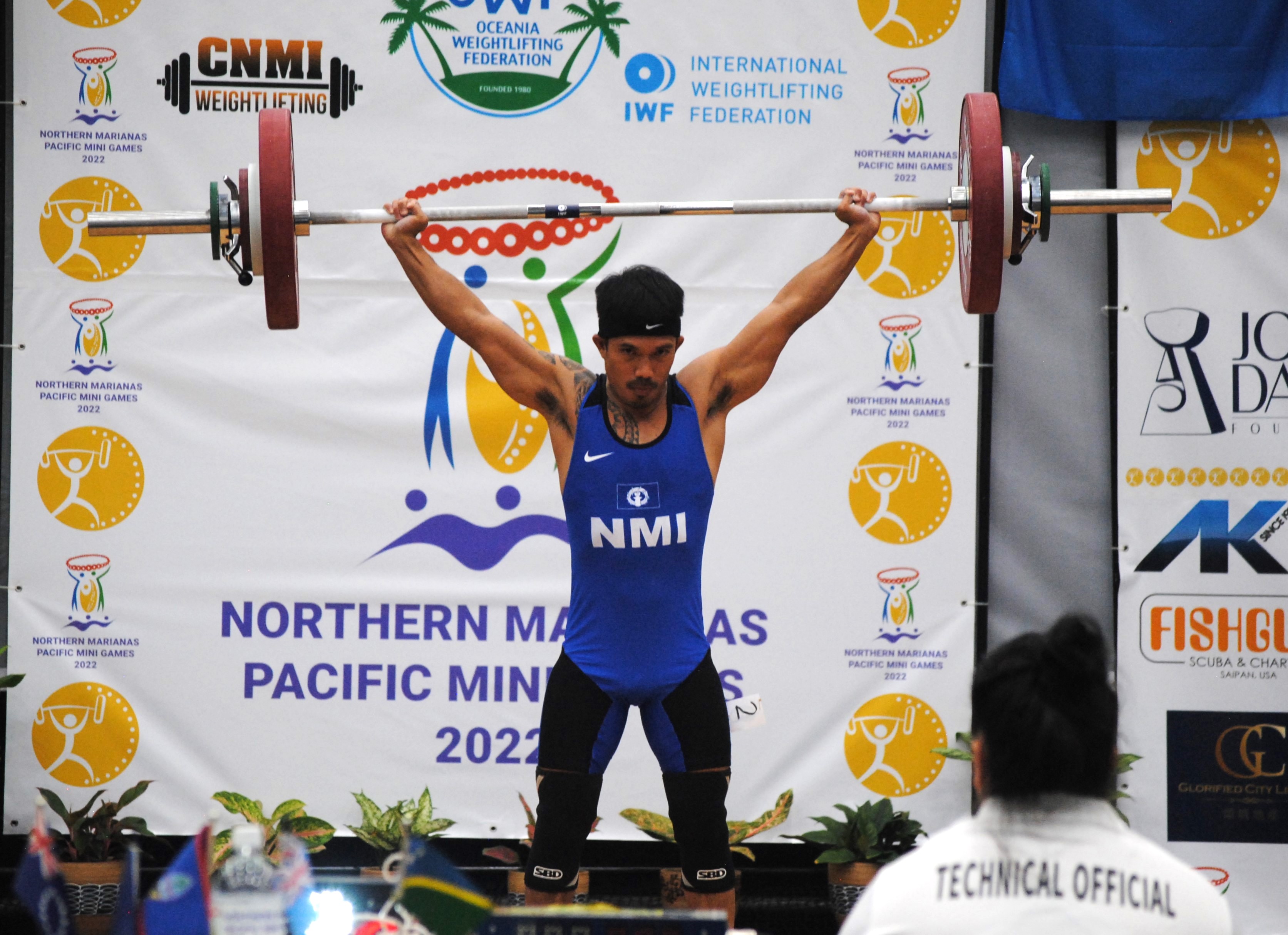 The NMI's Ray Santos successfully lifts 92kg in the snatch portion during the 2022 Pacific Mini Games  at the MHS gym.