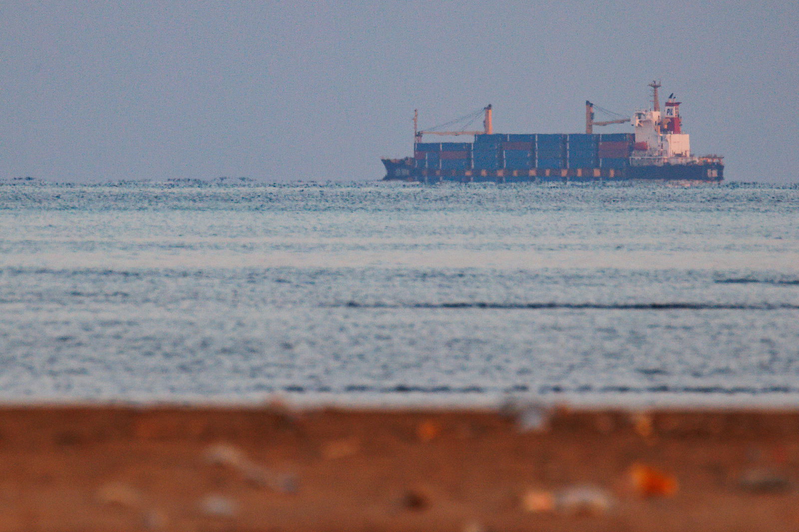 The container ship, Kota Rahmat -- with the destination 'VSL NO LINK ISRAEL' -- approaches the Bab-el-Mandeb strait on Jan. 18, 2024, in Obock, Djibouti. 