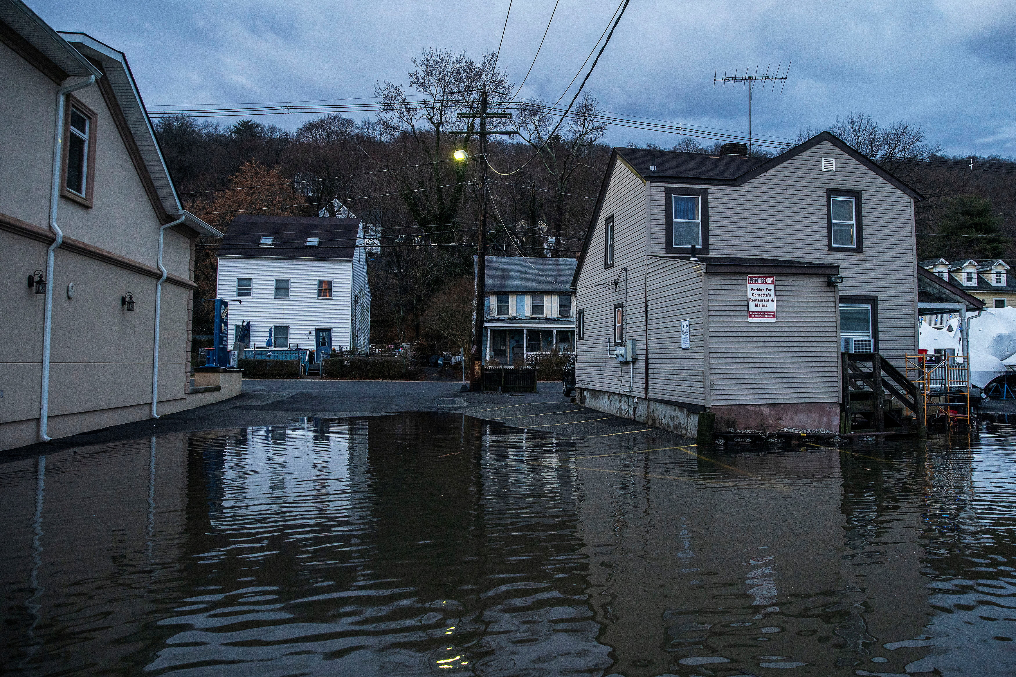 Water rises at a residential area in an aftermath of a storm in Piermont, New York, U.S., January 10, 2024. 