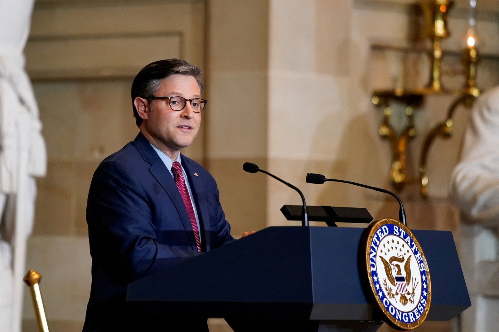 U.S. House Speaker Mike Johnson (R-LA) speaks during a Congressional Gold Medal ceremony posthumously honoring Major League Baseball player, civil rights activist and World War II veteran, Lawrence Eugene “Larry” Doby, in Statuary Hall at the U.S. Capitol in Washington, U.S., December 13, 2023. 