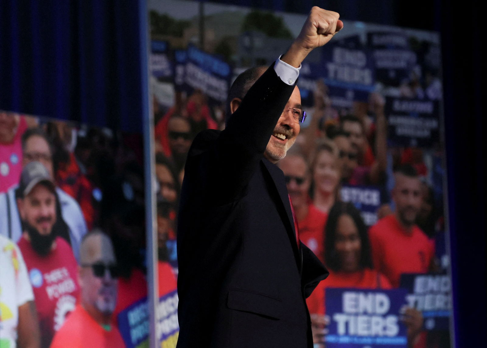 United Auto Workers (UAW) President Shawn Fain speaks to United Auto Workers members prior to U.S. President Joe Biden's speech at the UAW's Community Action Program (CAP) legislative conference in Washington, U.S., January 24, 2024.