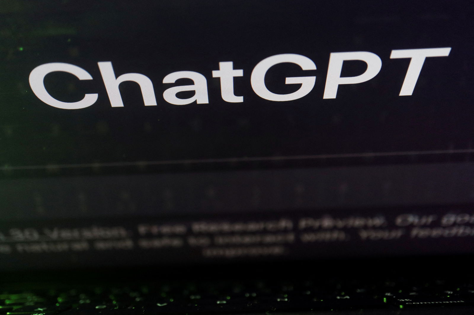 A keyboard is seen reflected on a computer screen displaying the website of ChatGPT, an AI chatbot from OpenAI, in this illustration picture taken February 8, 2023. 