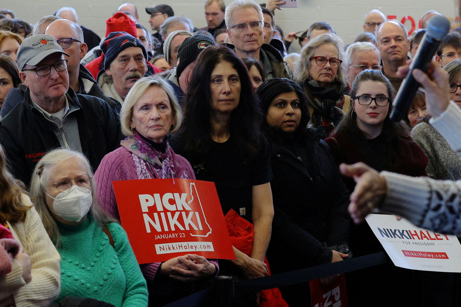 Audience members listen as Republican presidential candidate and former U.S. Ambassador to the United Nations Nikki Haley speaks at a Get Out the Vote campaign rally ahead of the New Hampshire primary election in Derry, New Hampshire, U.S., January 21, 2024. 