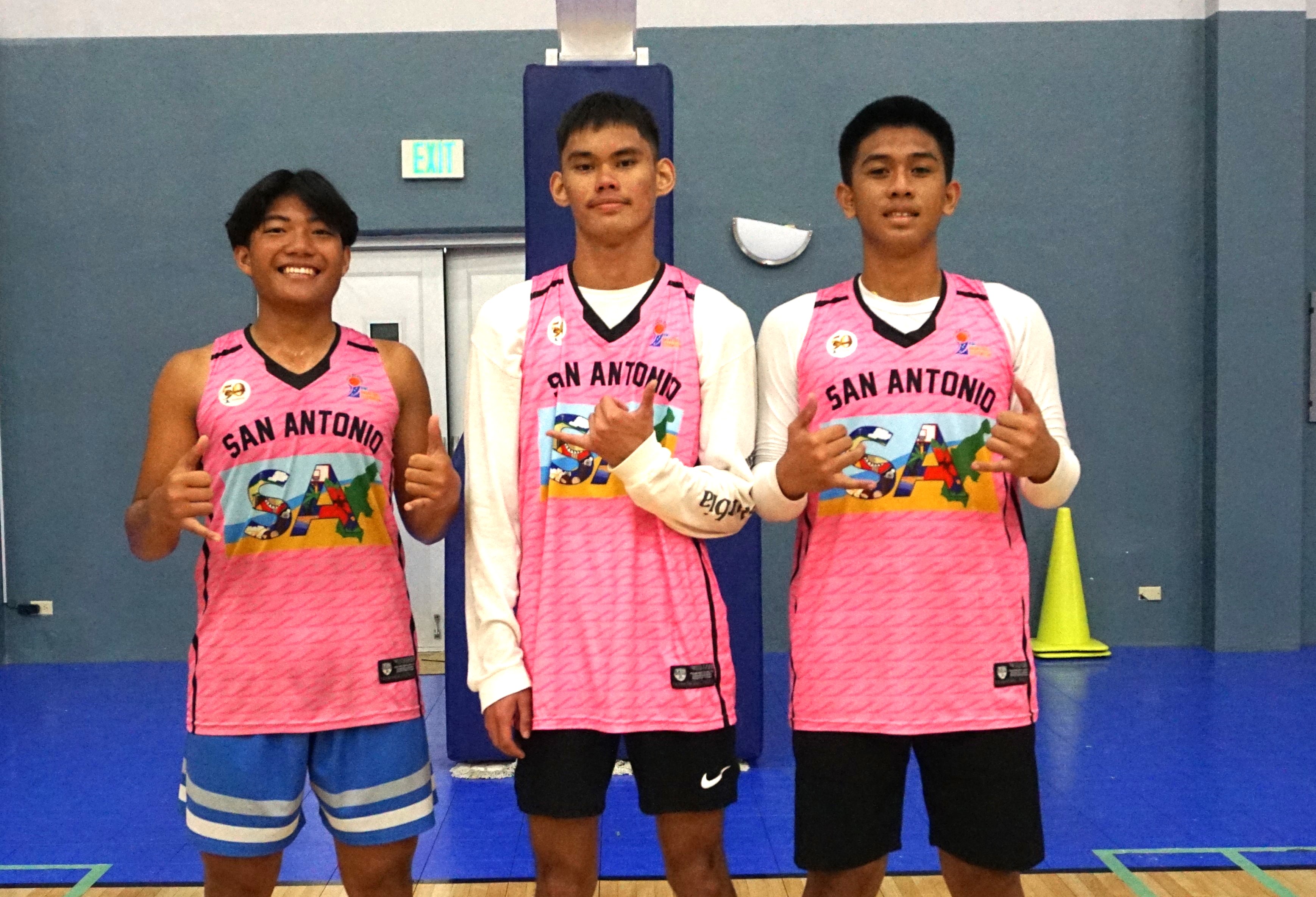 Shots Fired's Jezpher Navarro, Austin Diaz, and Christian Lucero pose for a photo after winning the third tournament of the Marianas Arsenal 3x3 Series at the Ada gym on Saturday.
