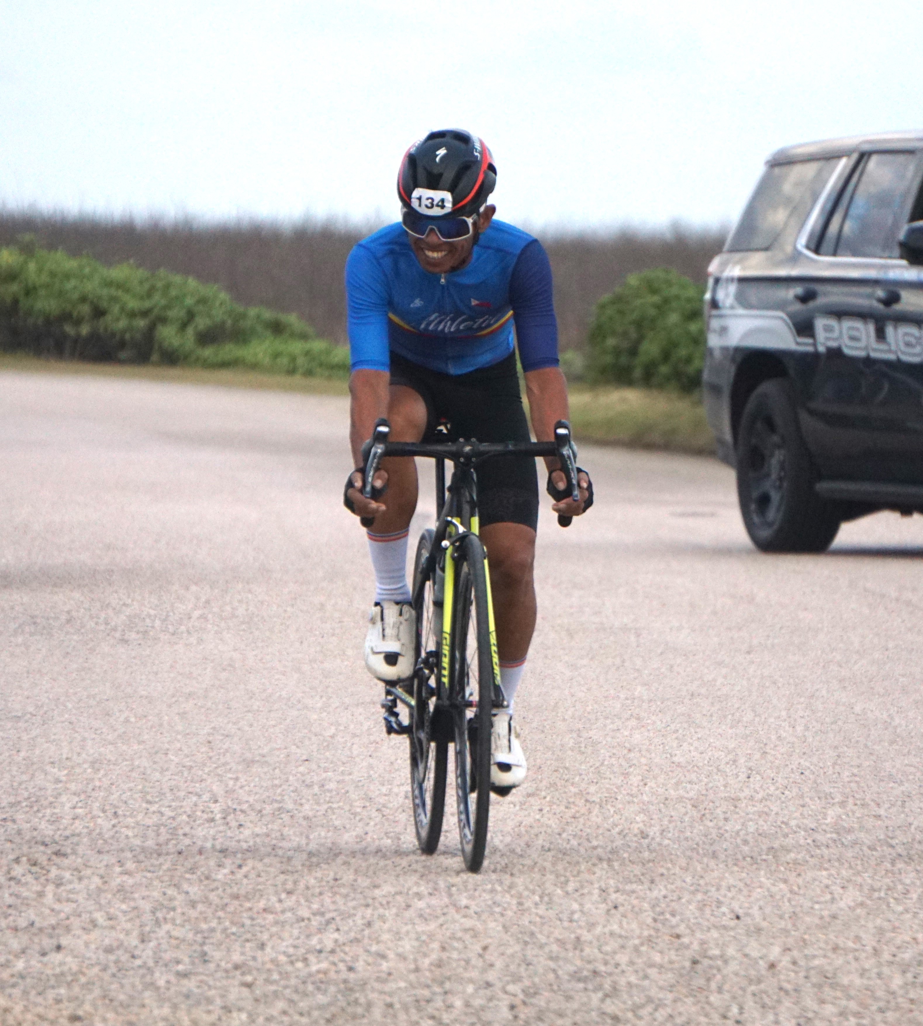 Joel Buco approaches the finish line of the 2024 Rotary Club of Saipan “End Polio Now” Cycling Challenge at Banzai Cliff on Saturday.