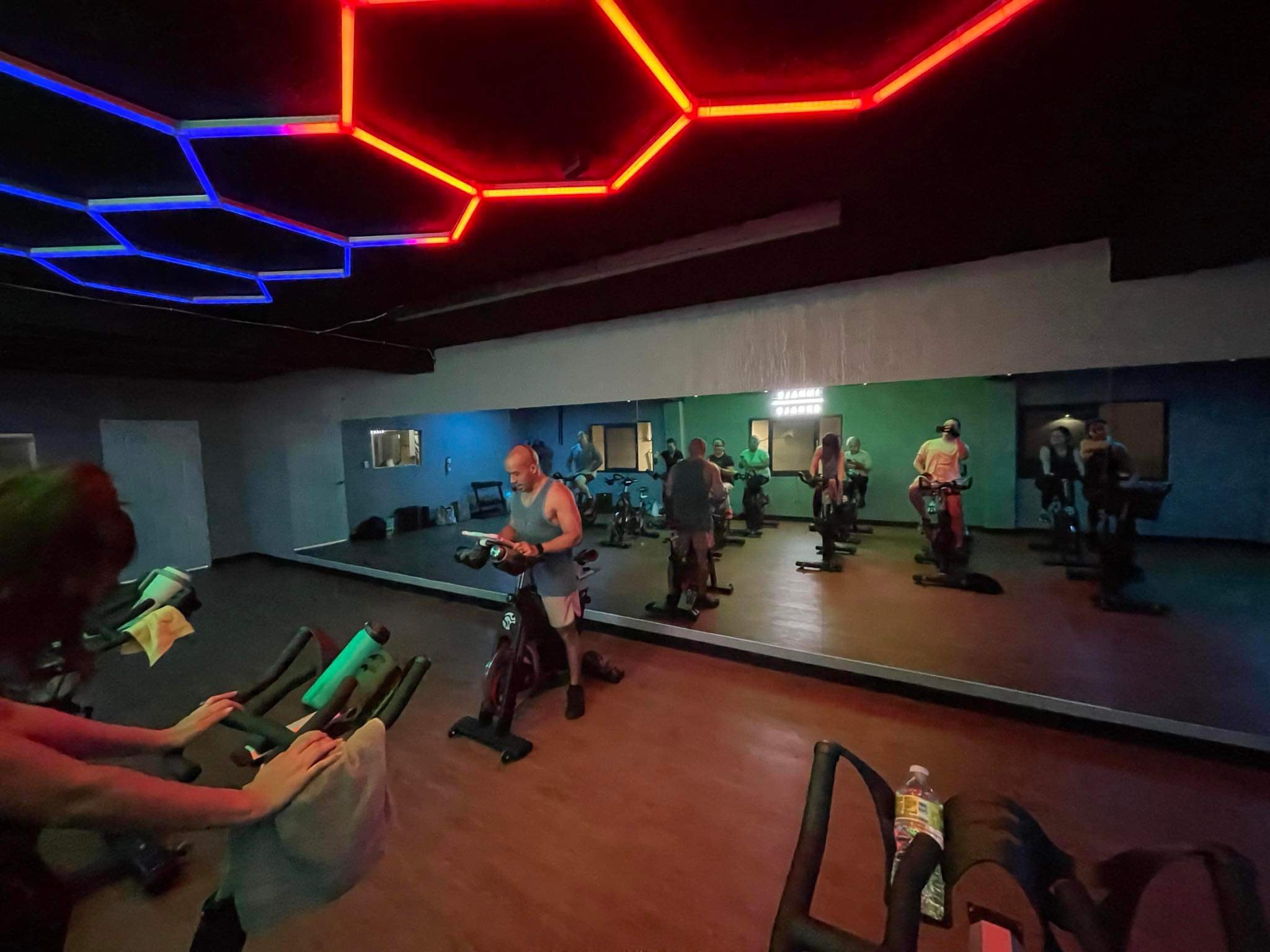 Josh Brazzle conducts an Electronic Dance Music or EDM spin class at Latte Built in Chalan Kanoa.