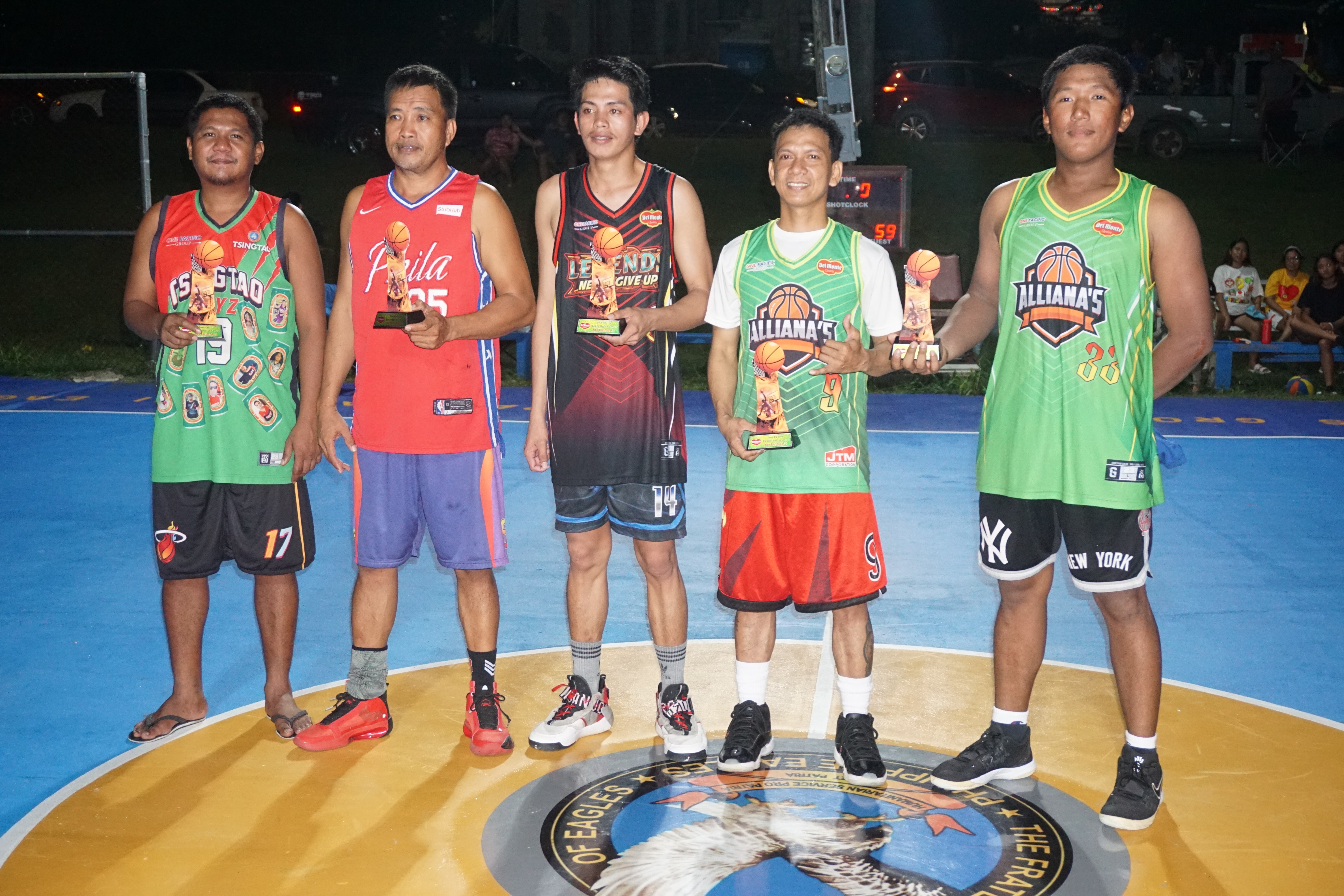 The Mythical Five awardees pose for a photo during the awards ceremony of the 2023 Pacific Saipan Invitational Basketball League at the Gualo Rai basketball court on Wednesday.