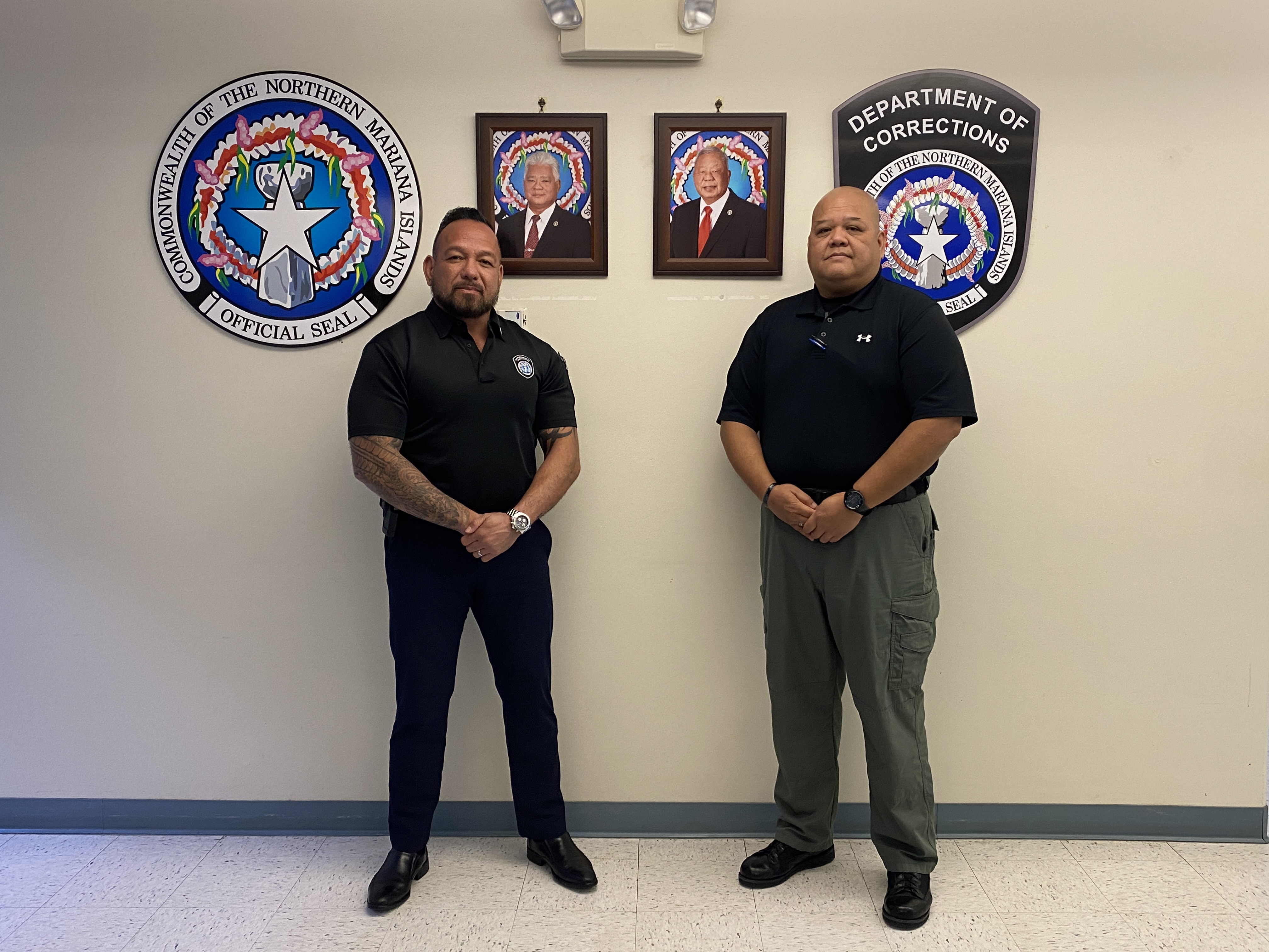 Department of Corrections Commissioner Anthony Torres, left, and his new deputy, Anthony Macaranas, pose for a photo during a press conference at the corrections facility on Jan. 8, 2024.