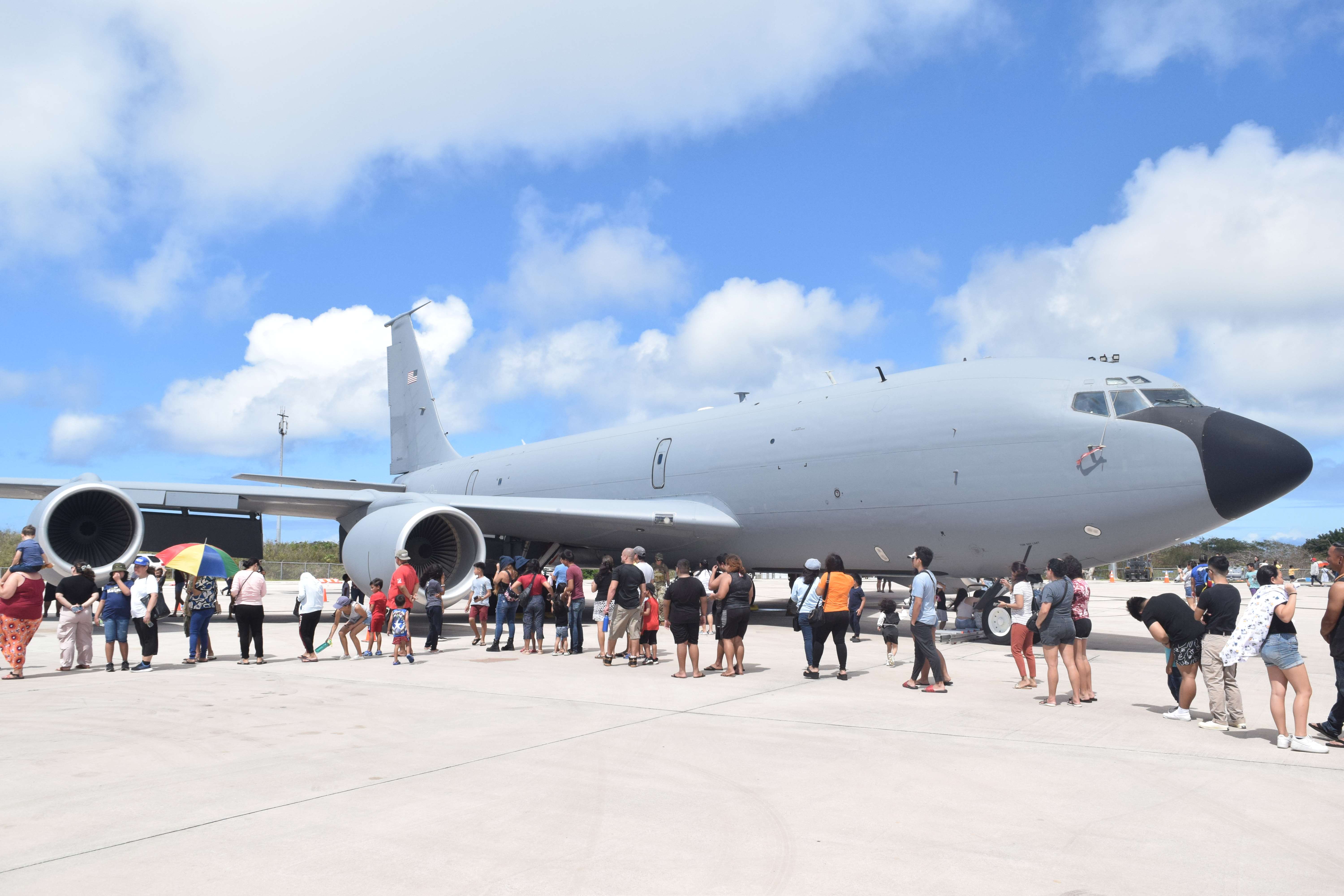 Local residents line up for an opportunity to see the inside of a KC-135 air-to-air refueling aircraft at the Francisco C. Ada/Saipan International Airport on Saturday.  