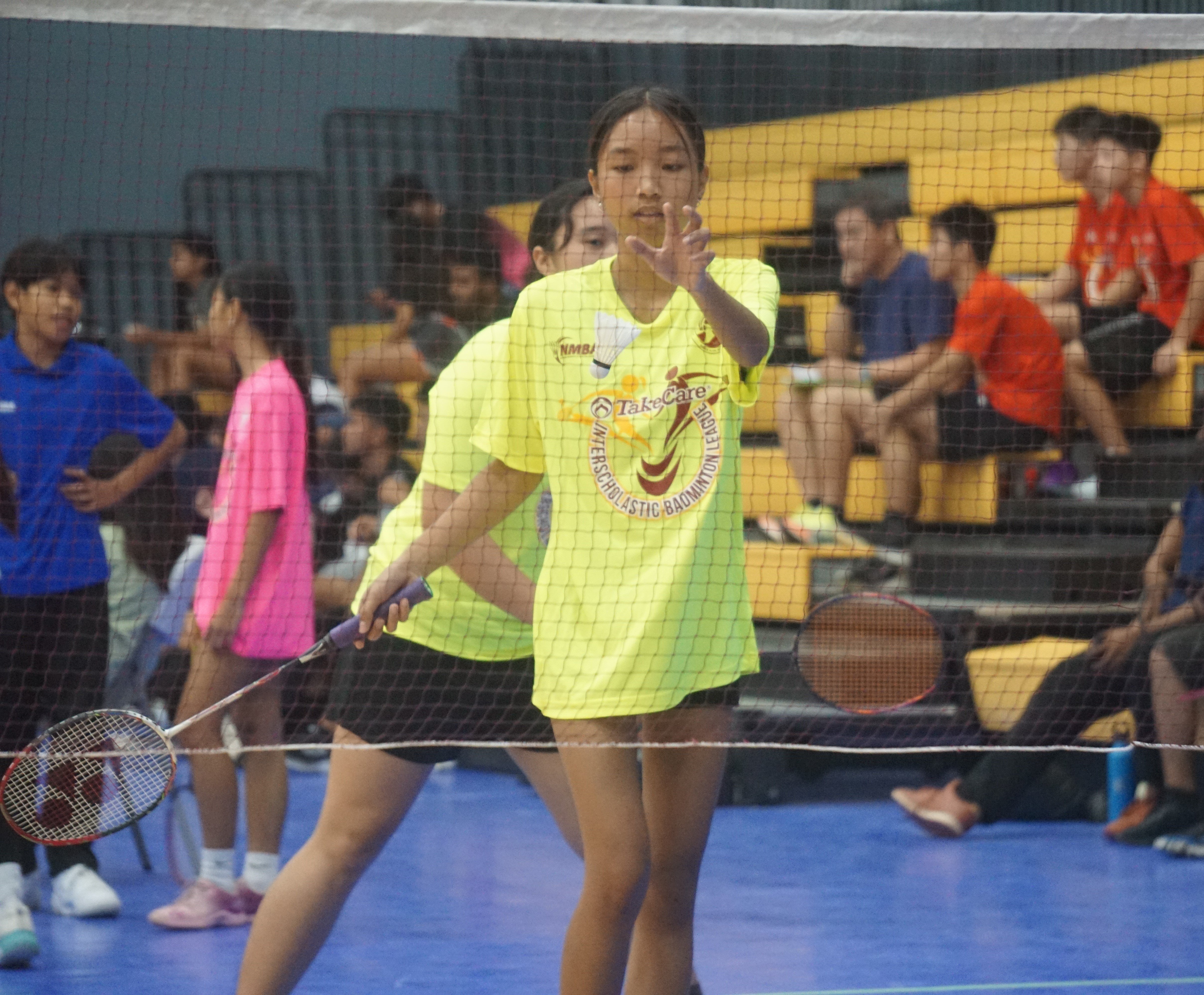 A Saipan Southern High School player connects the fronthand return during a women's doubles event in the co-ed high school division of the NMBF-PSS Interscholastic Badminton League SY23-24 at the Ada gym on Saturday.
