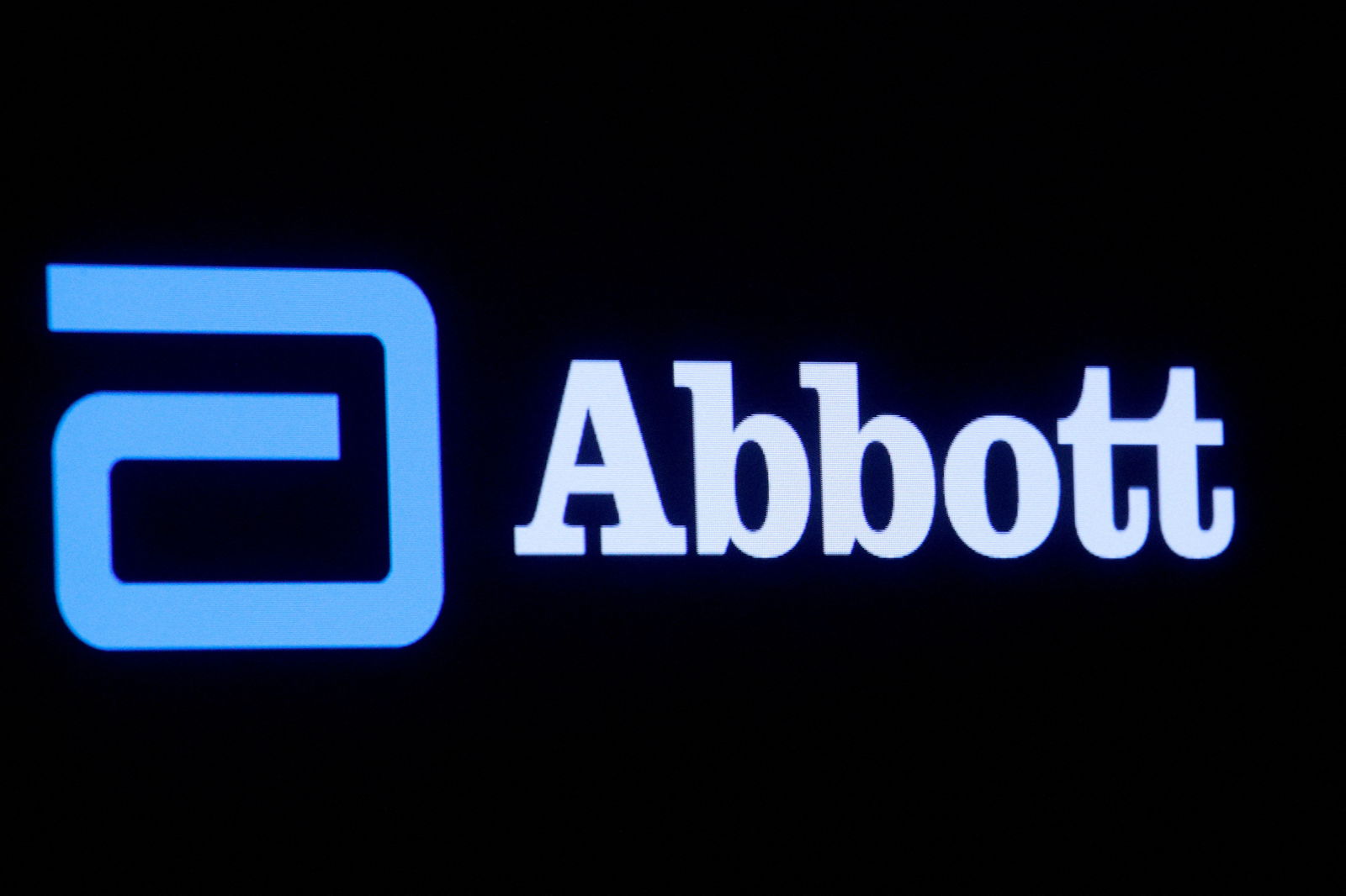 Abbott Laboratories logo is displayed on a screen at the New York Stock Exchange (NYSE) in New York City, U.S., October 18, 2021. 
