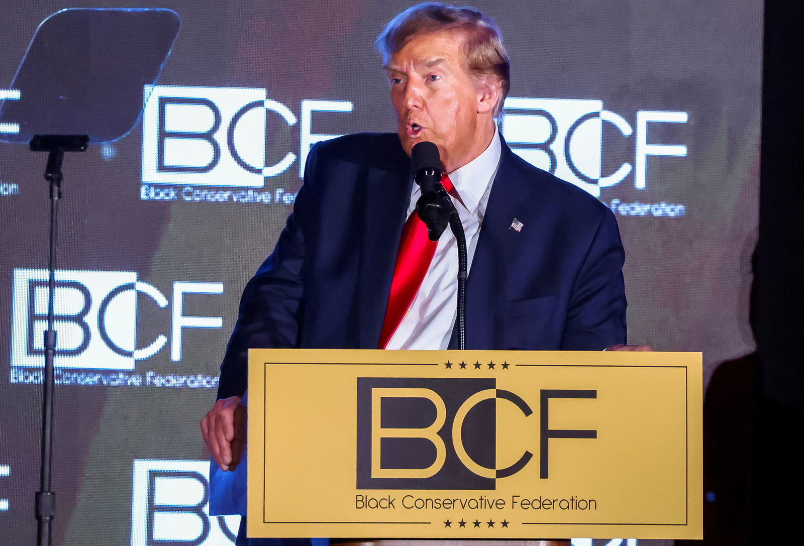 FILE PHOTO: Republican presidential candidate and former U.S. President Donald Trump delivers a keynote speech at the Black Conservative Federation gala dinner, ahead of the South Carolina Republican presidential primary in Columbia, South Carolina, U.S., February 23, 2024. 