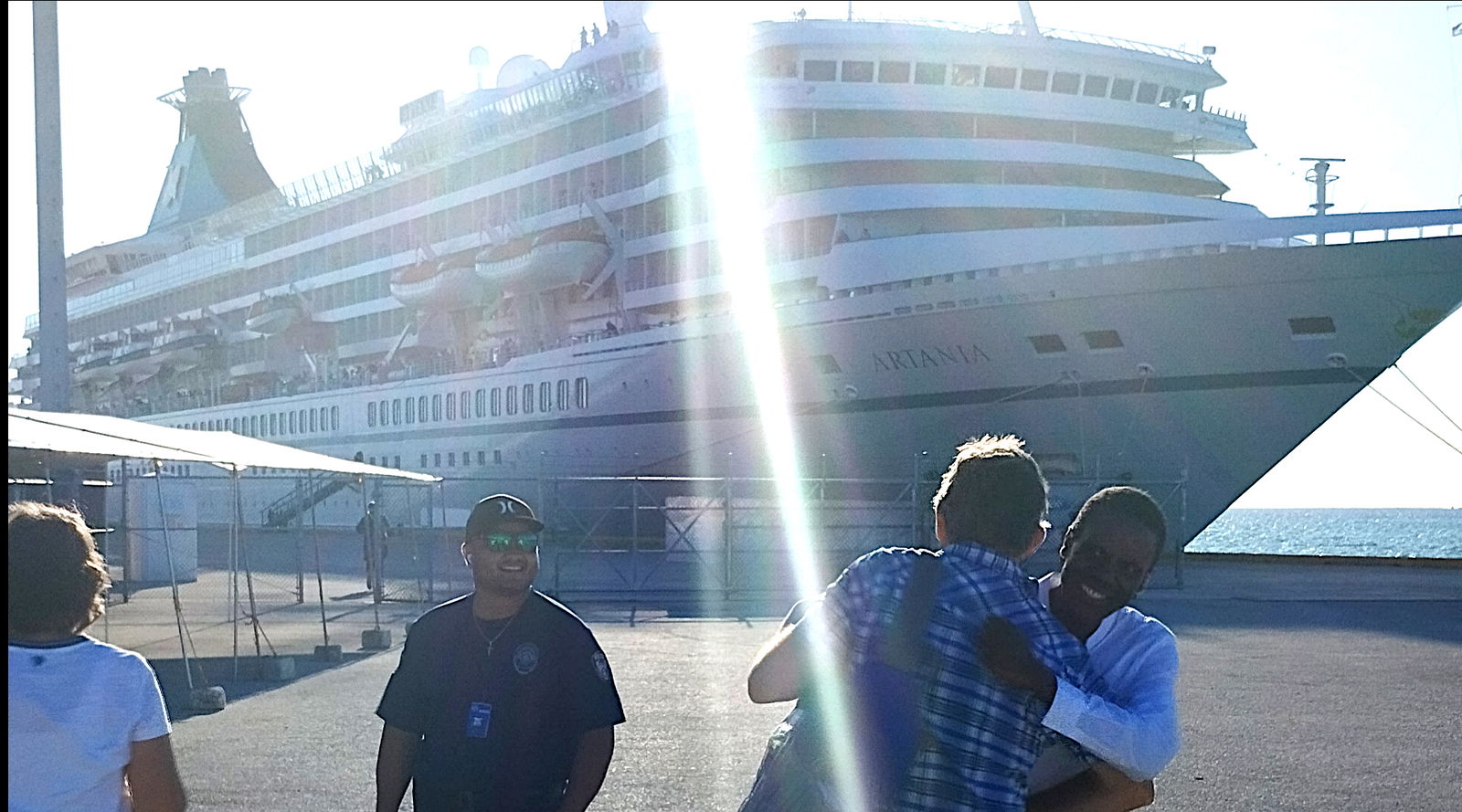 A final goodbye at the port of Saipan as MS Artania prepares for departure.