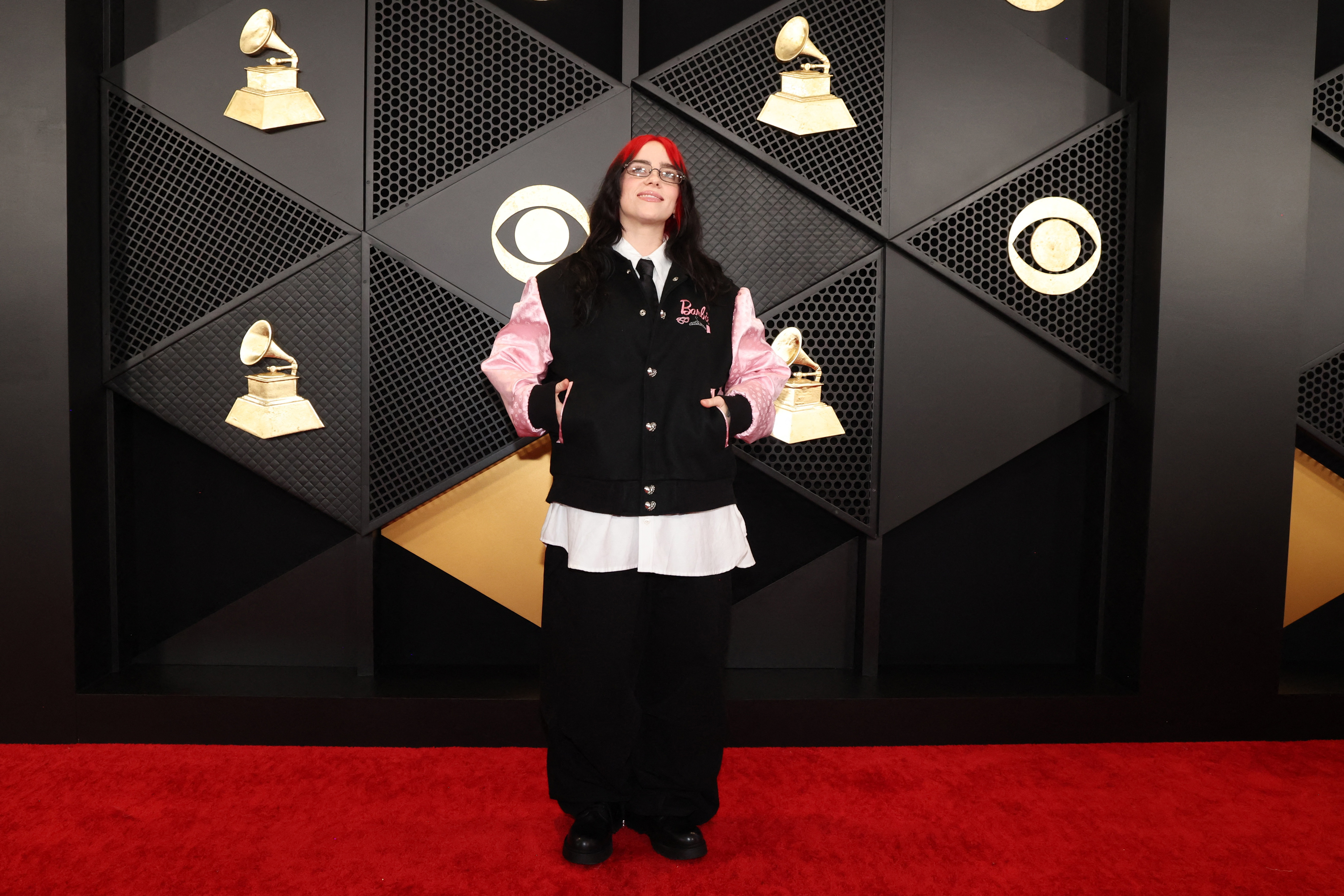 Billie Eilish poses on the red carpet as she attends the 66th Annual Grammy Awards in Los Angeles, California, U.S., February 4, 2024. 