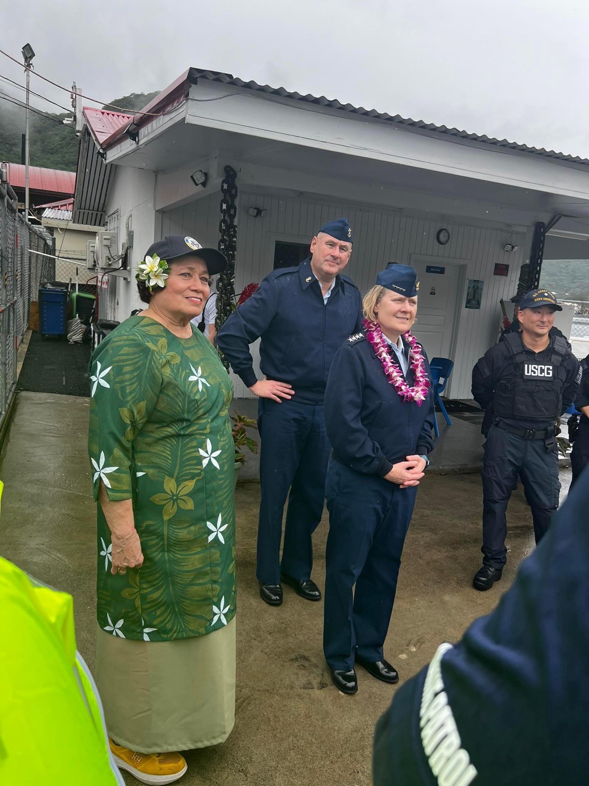 Going through the harbor facilities with the Coast Guard commandant.