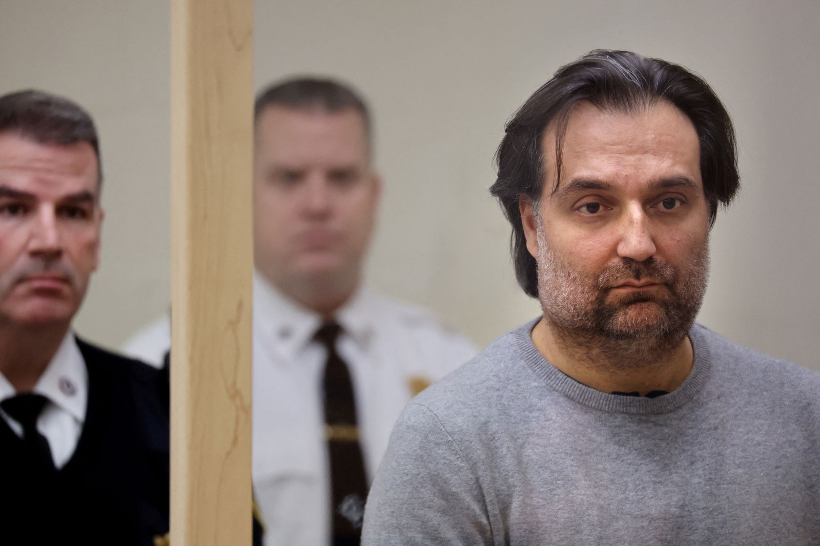 FILE PHOTO: Brian Walshe listens to prosecutor Lynn Beland during his arraignment at Quincy District Court on a charge of murdering his wife Ana Walshe, in Quincy, Massachusetts, U.S. on January 18, 2023. 