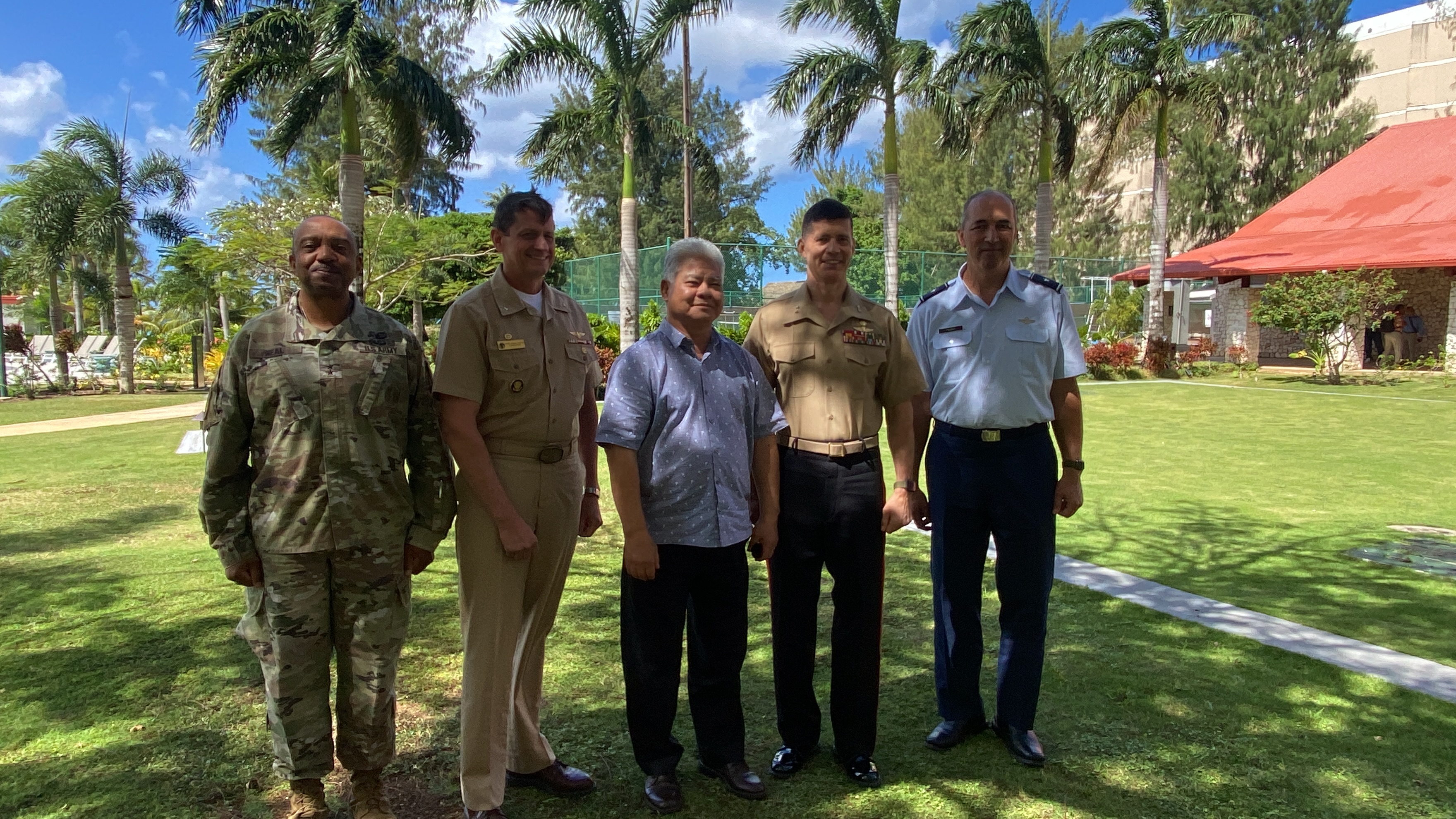 From left, Maj. Gen. Reginald Neil, Rear Adm. Greg Huffman, Gov. Arnold I. Palacios, Maj. Gen. Mark Hashimoto and Brig. Gen. Christopher Faurot pose for a photo at Crowne Plaza Resort where CNMI and military officials gathered for a stakeholders meeting Thursday.