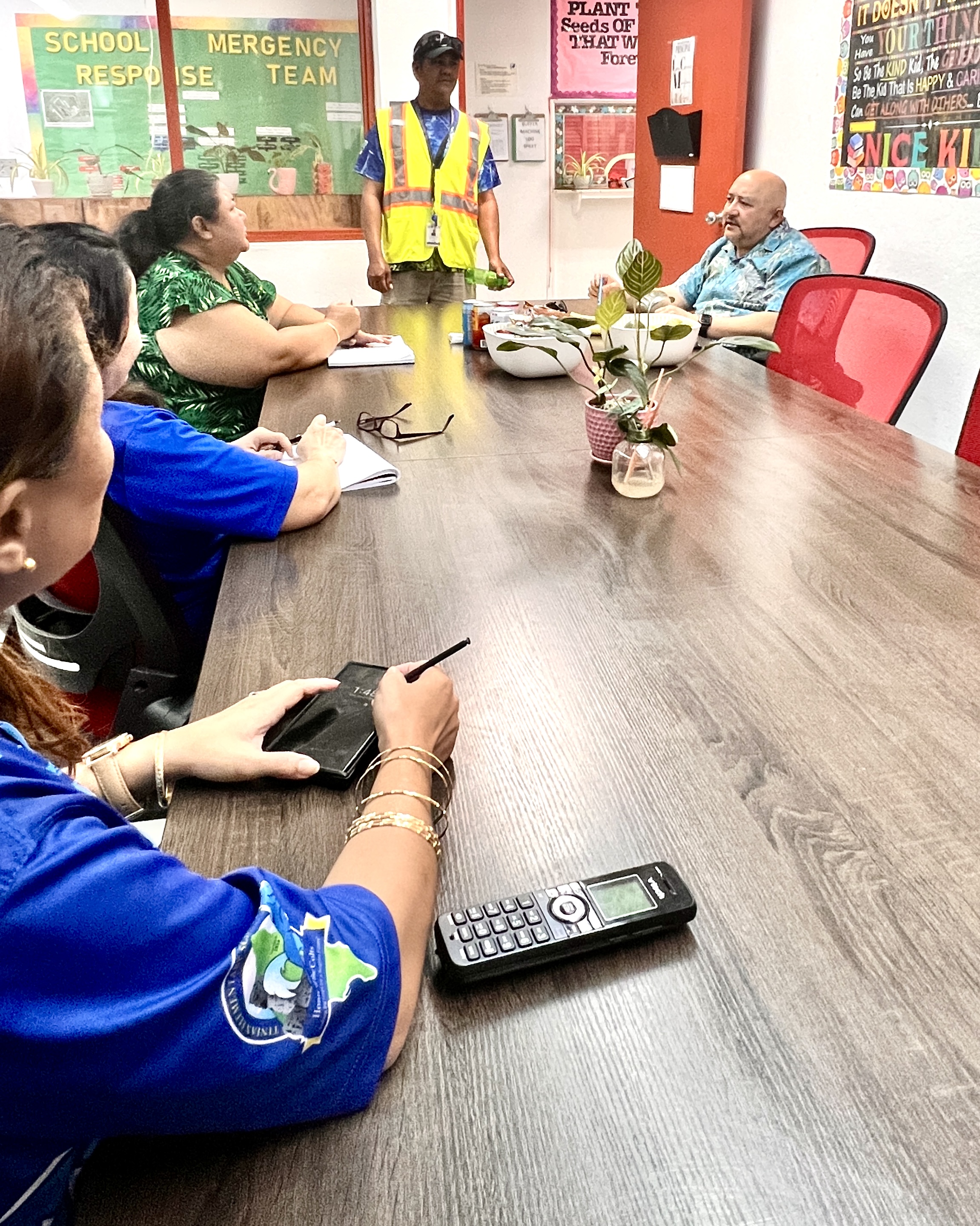 Education Commissioner Dr. Lawrence F. Camacho meets with Tinian Elementary School Principal Lou Connie Manglona and other school personnel. 