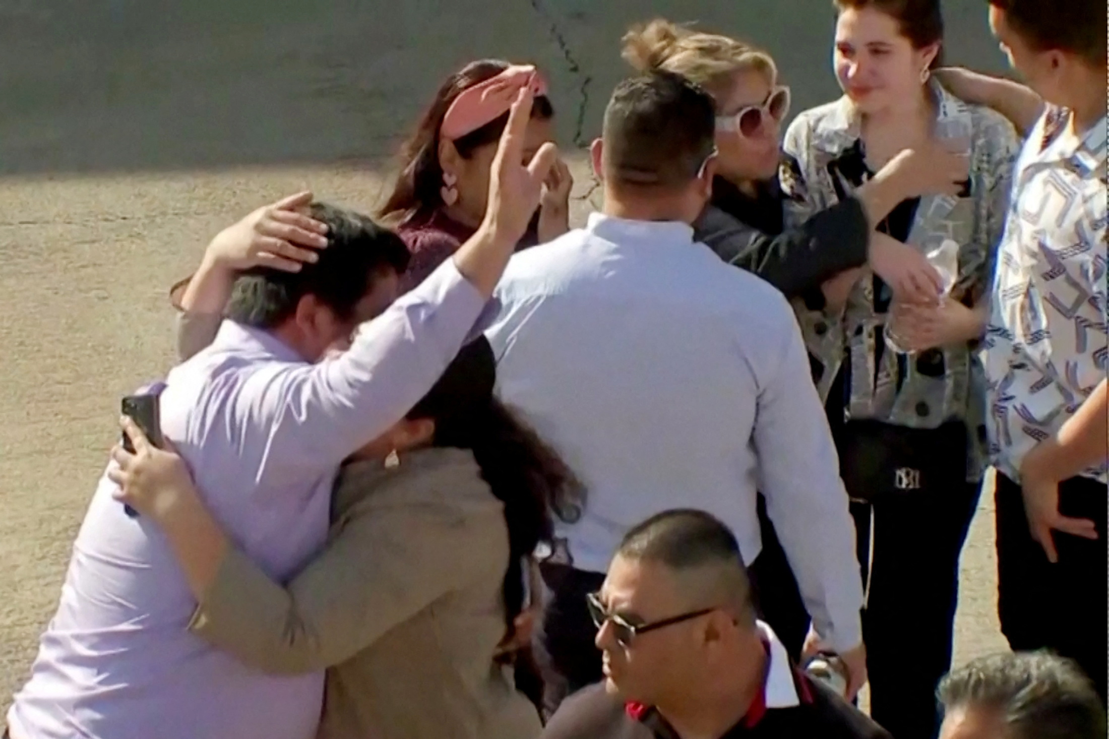 Evacuated parishoners react outside television evangelist Joel Osteen's Lakewood Church after a shooting incident in Houston, Texas, U.S. February 11, 2024 in a still image from video. 